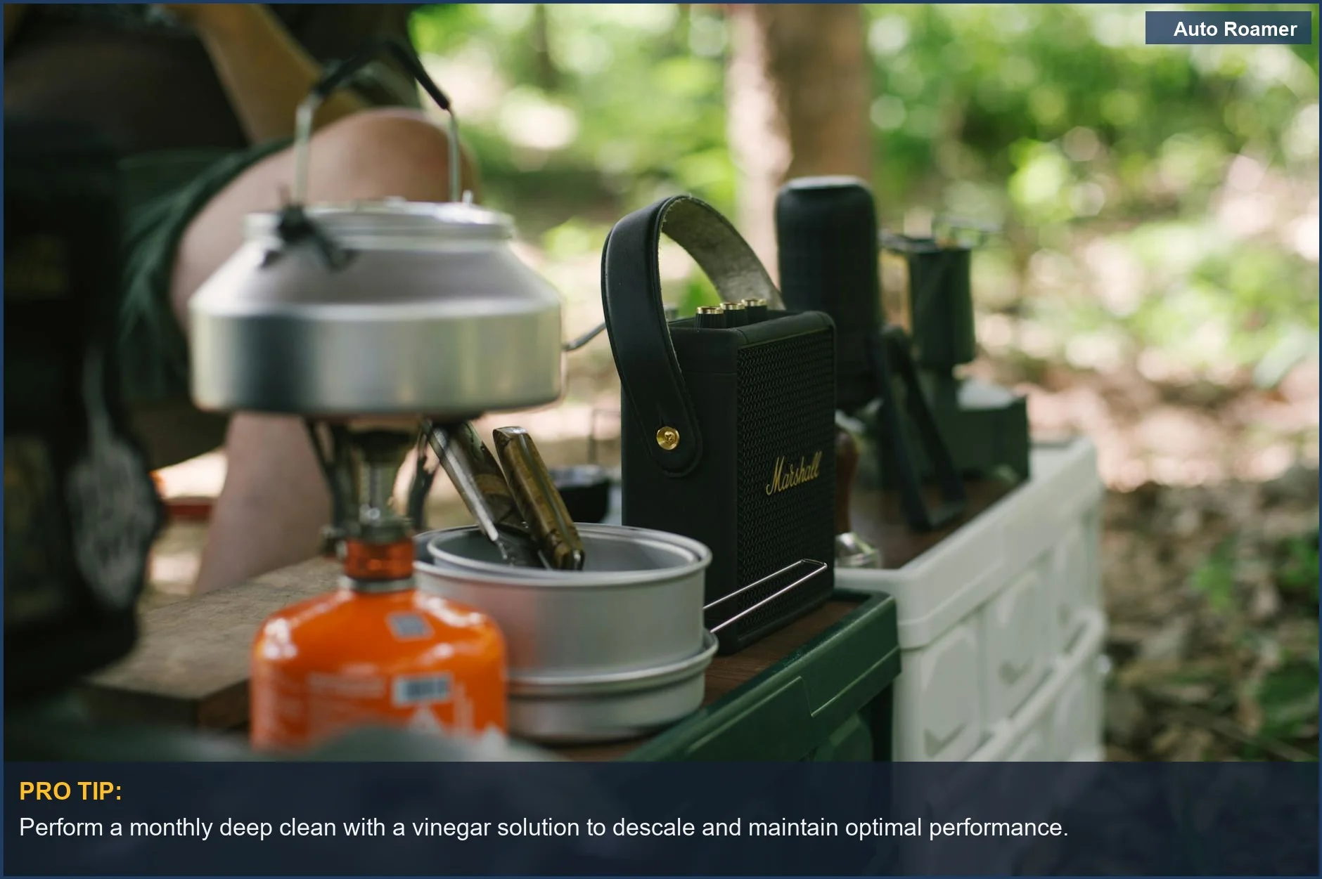 Outdoor camping gear, gas stove and kettle, in a forest setting, highlighting coffee maker care.