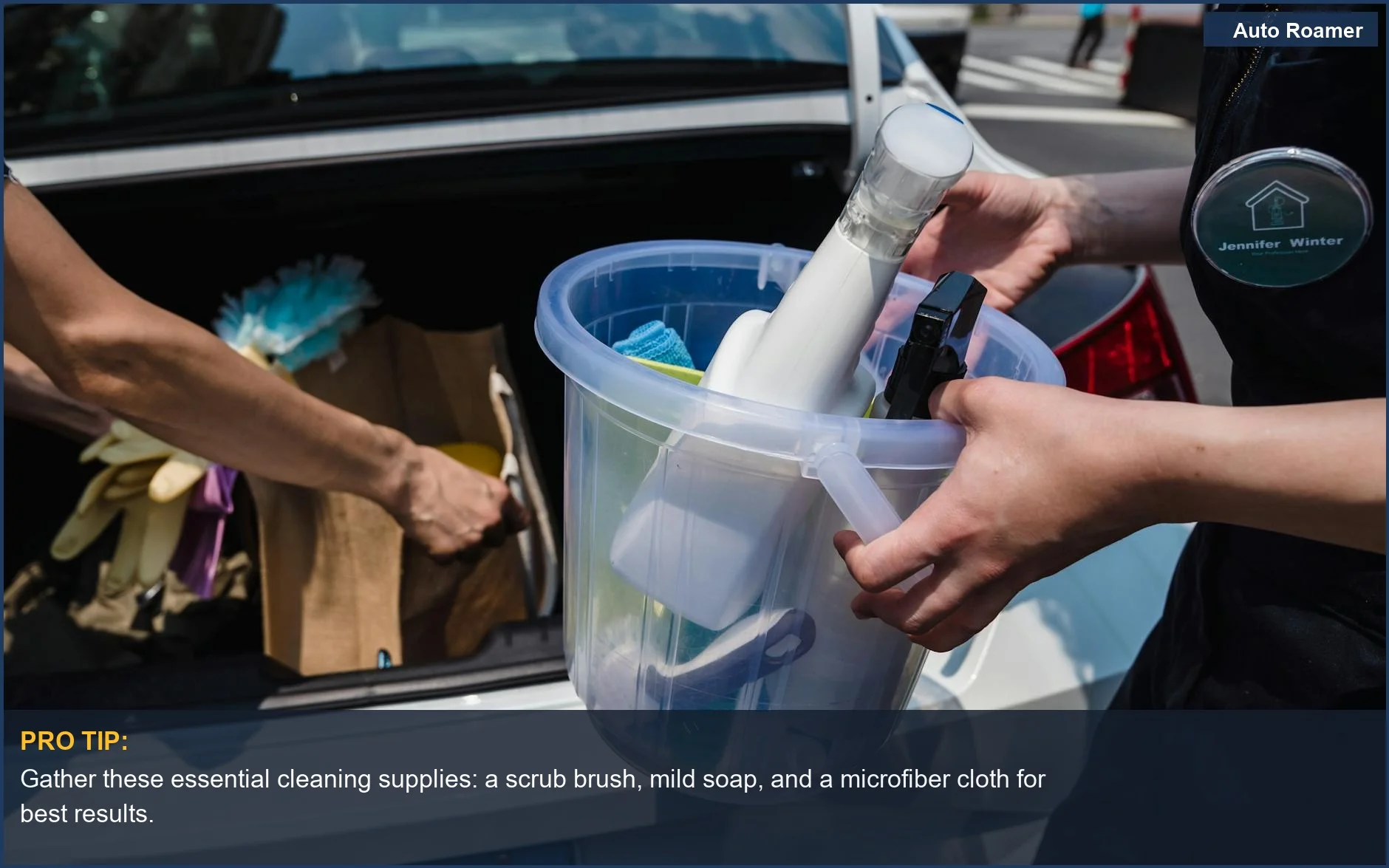 Close-up of car cleaning supplies in a bucket near an SUV trunk, essential for camping mess cleanup.