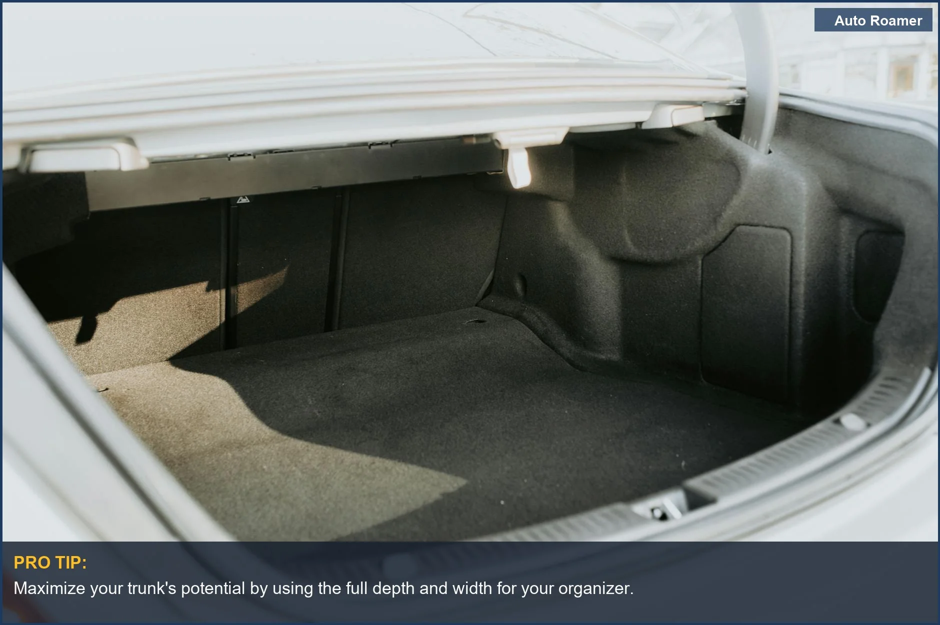 Empty car trunk bathed in sunlight, showcasing ample space for a foldable car organizer.