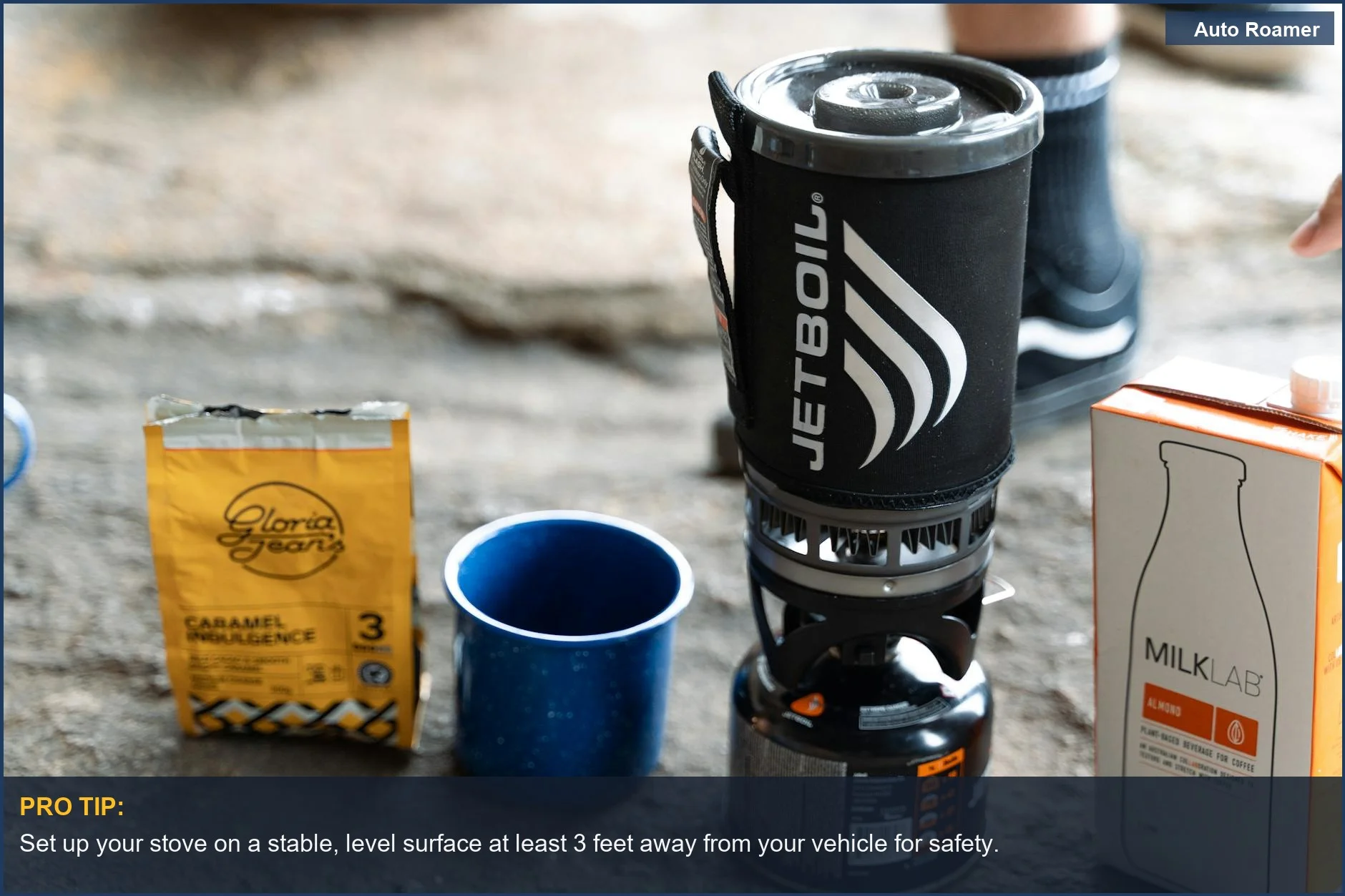 Compact camp stove setup for Subaru Outback car camping, including coffee and milk preparation.