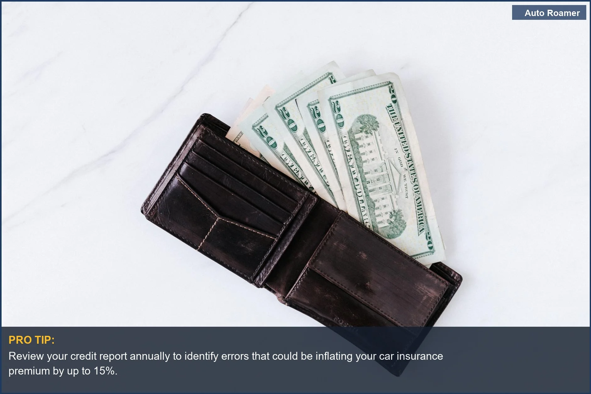 Heap of dollar banknotes in a black leather wallet, illustrating how credit score affects car insurance rates.