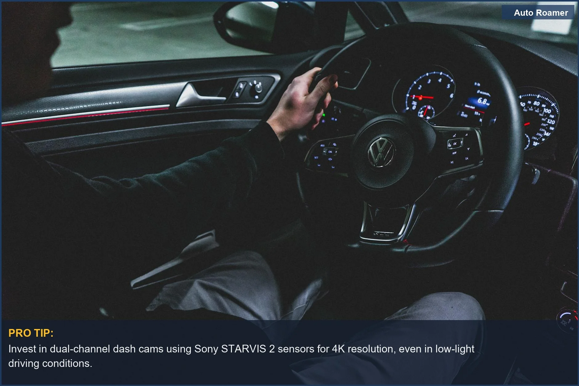 Driving a Volkswagen at night, focusing on the illuminated dashboard and steering wheel, with a dash cam in view.