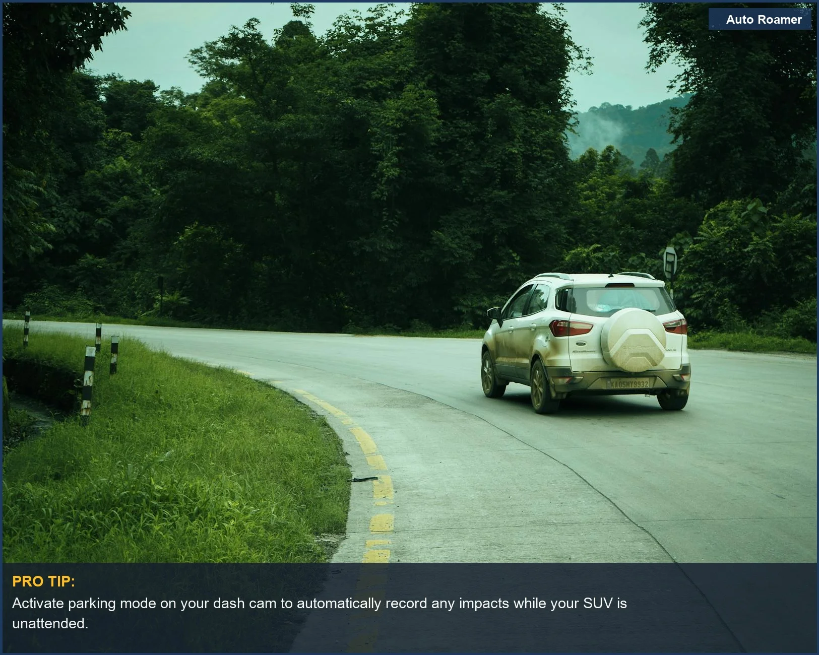 White SUV turning on a lush forest road, demonstrating dash cam parking mode for security.