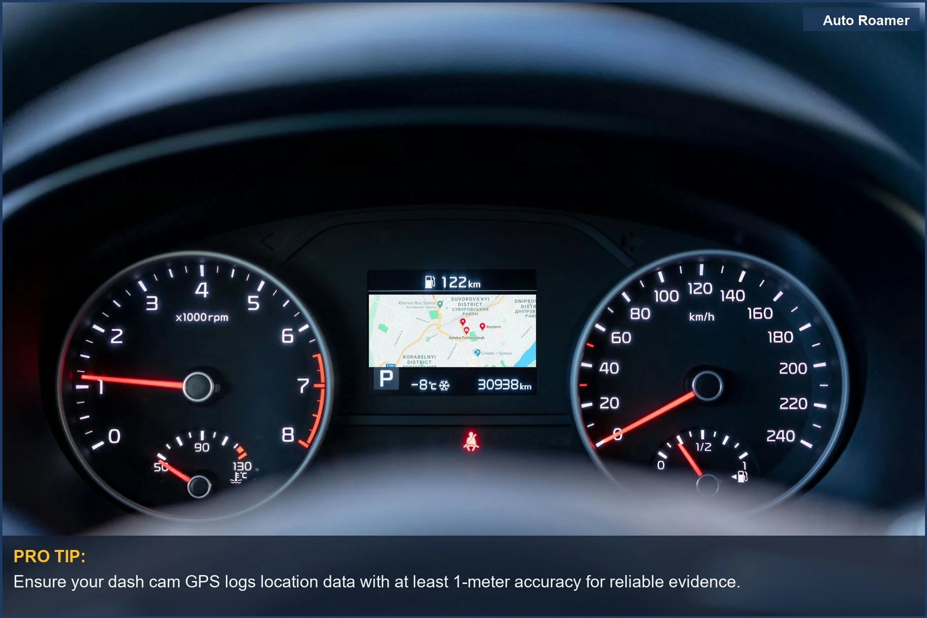 Close-up of car dashboard showing speedometer, tachometer, and GPS display, highlighting dash cam GPS logging.