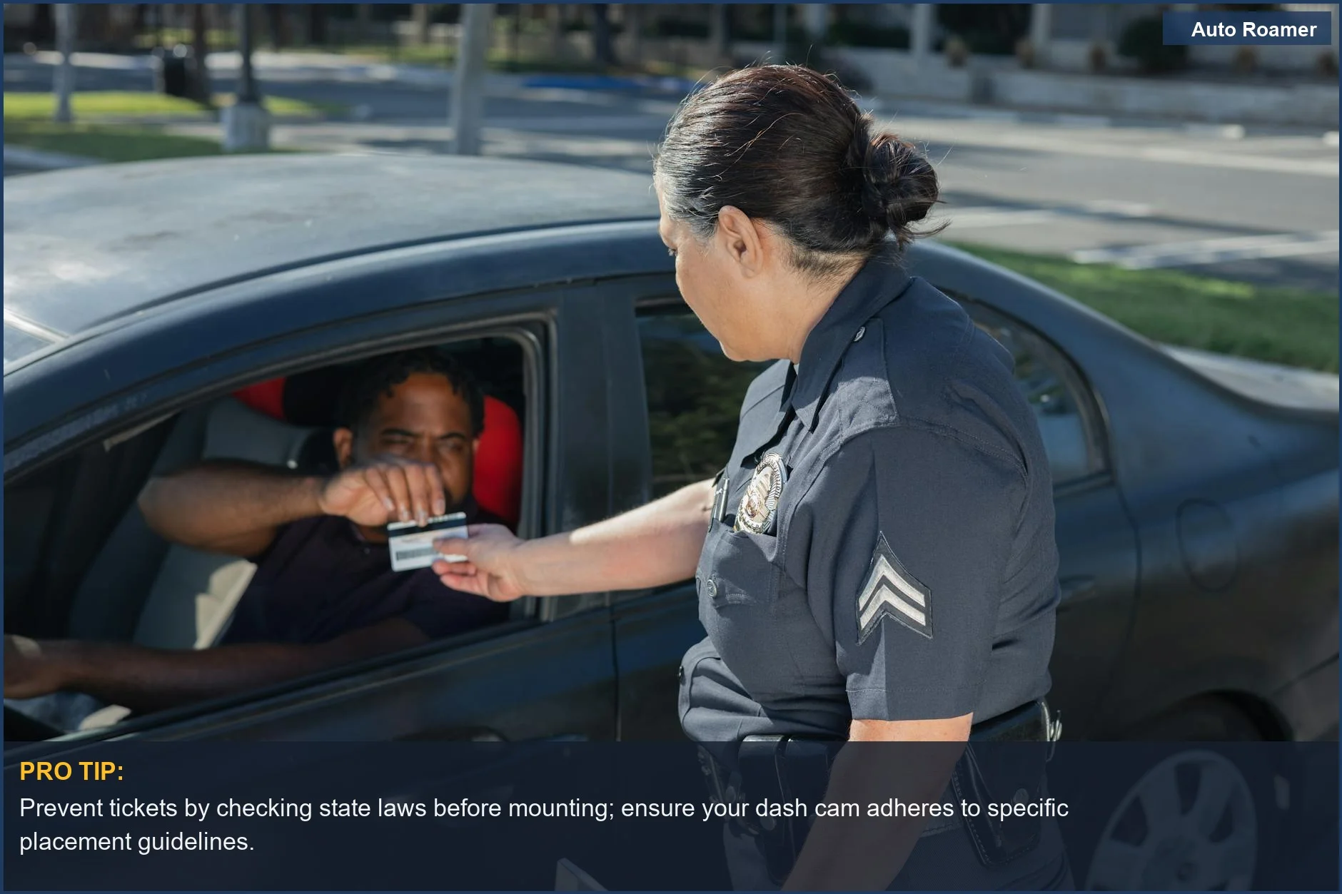 Police officer giving a ticket to a driver, illustrating potential consequences of not adhering to dash cam regulations.