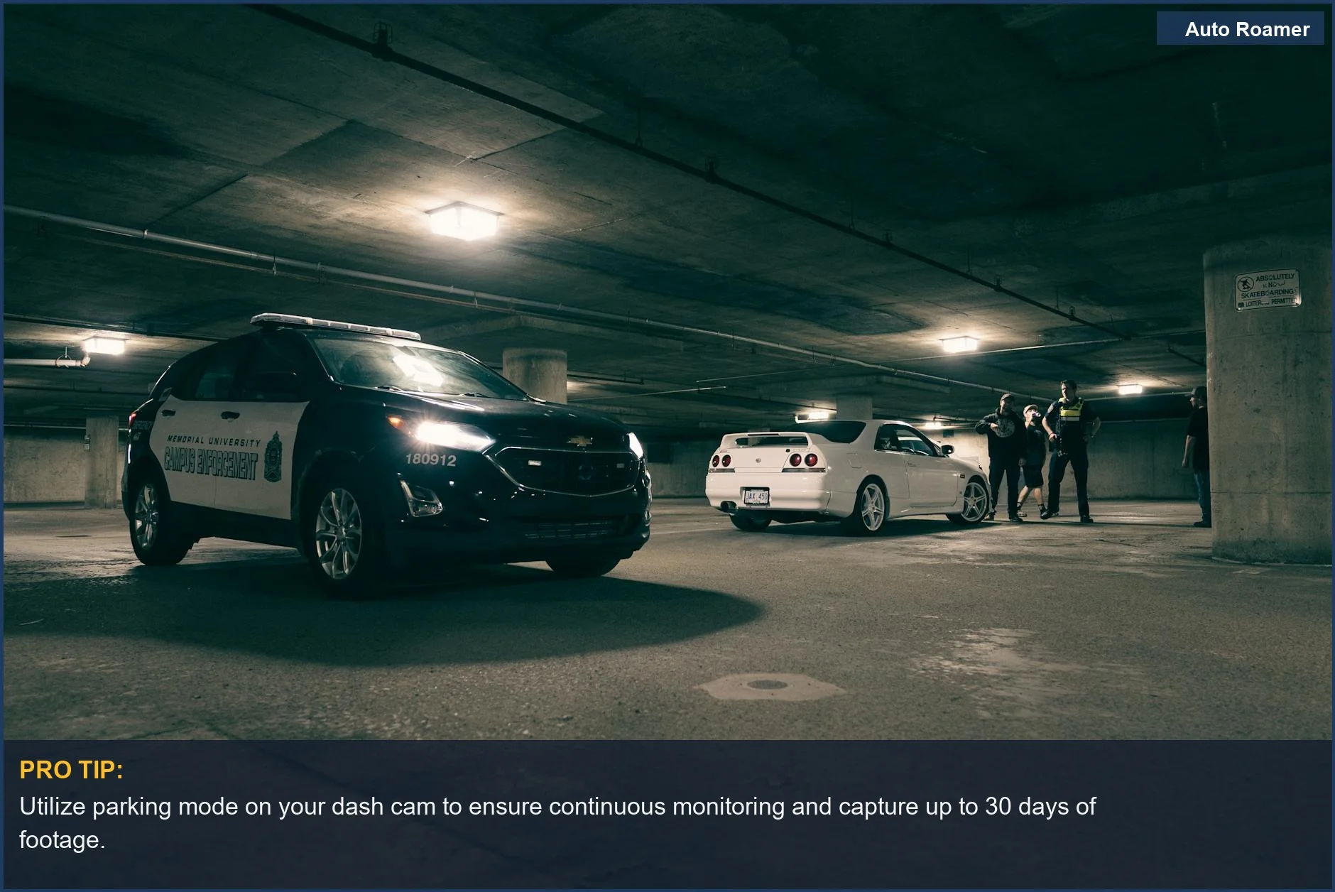 Motion detection dash cam provides security in a dark underground parking lot with police vehicles.