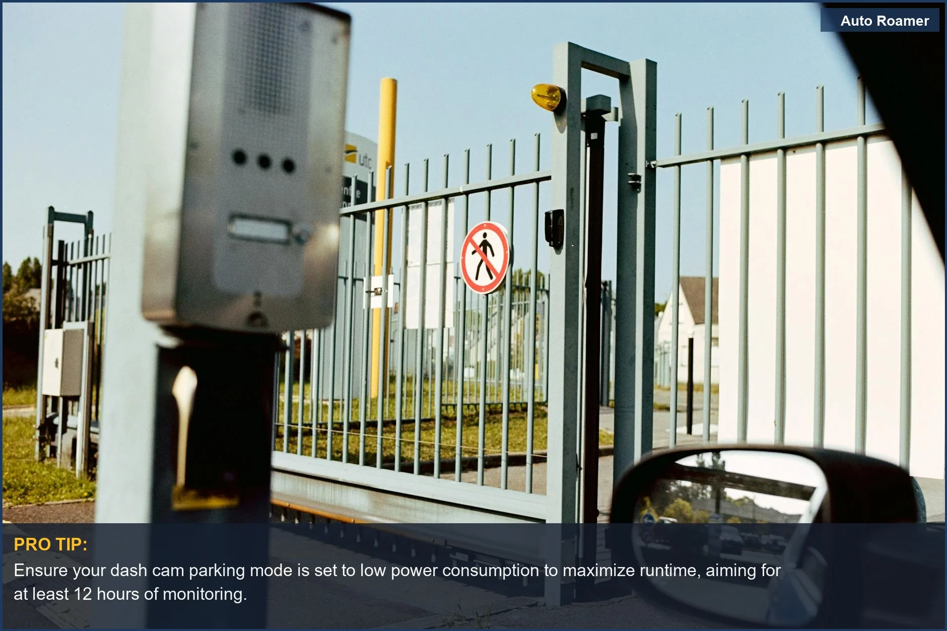 Dash cam parking mode activated view from car window at security gate.