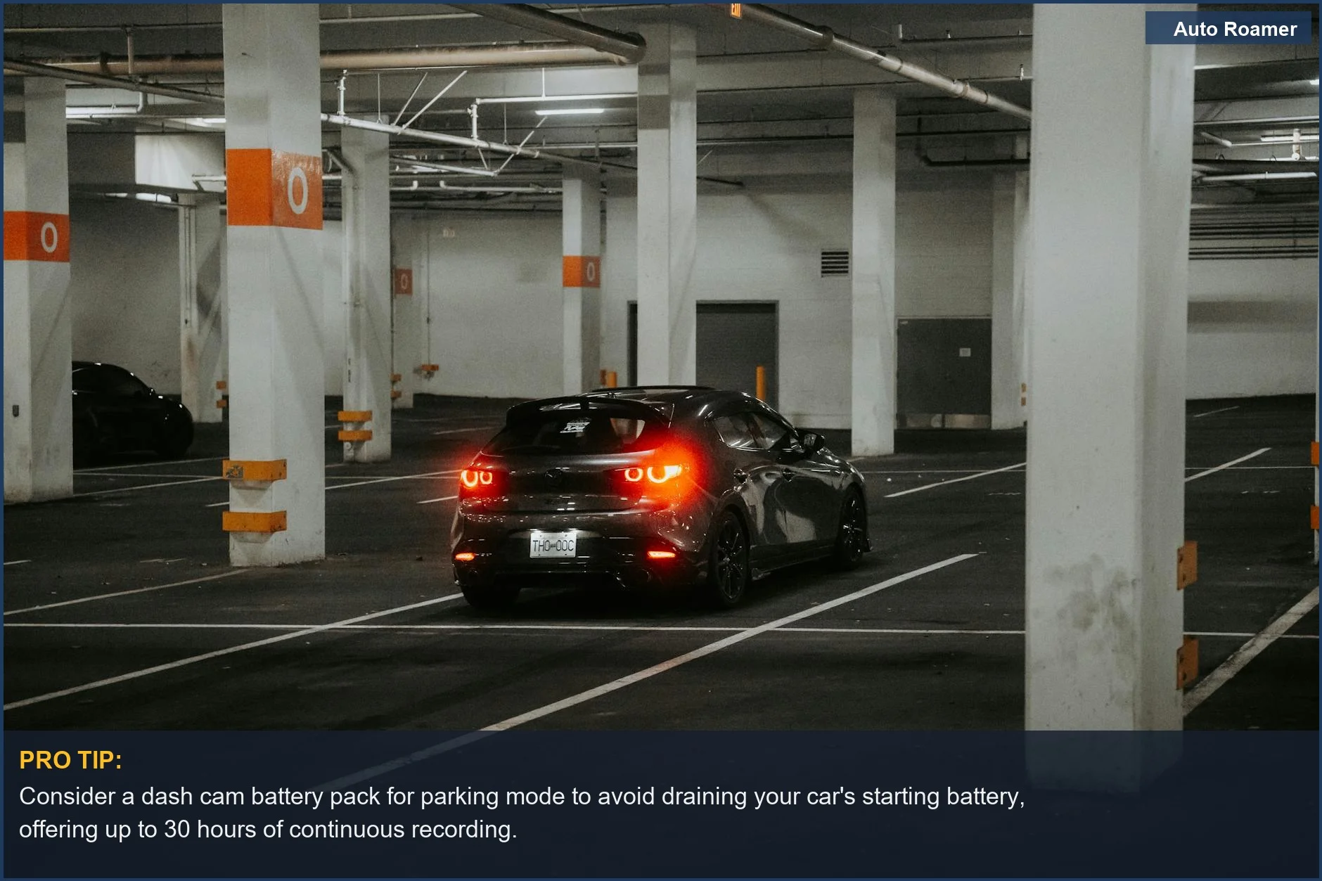 Underground garage parking with car taillights, illustrating dash cam battery for parking challenges.