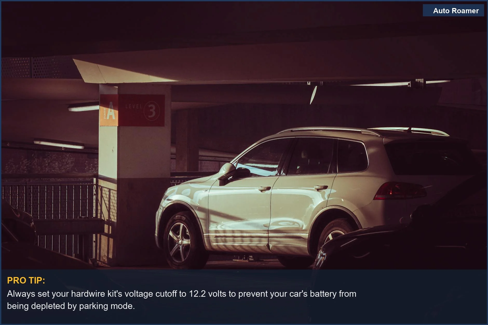 White SUV in indoor parking garage, illustrating parking mode power requirements.