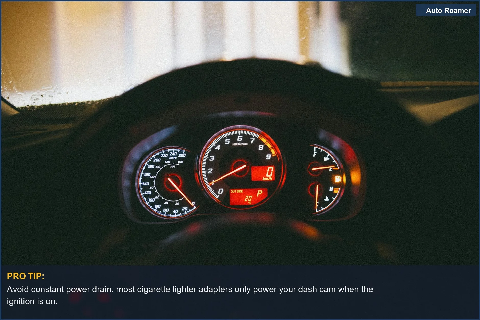 Nighttime view of a car dashboard's glowing gauges and controls, showing where a dash cam power cable might connect.