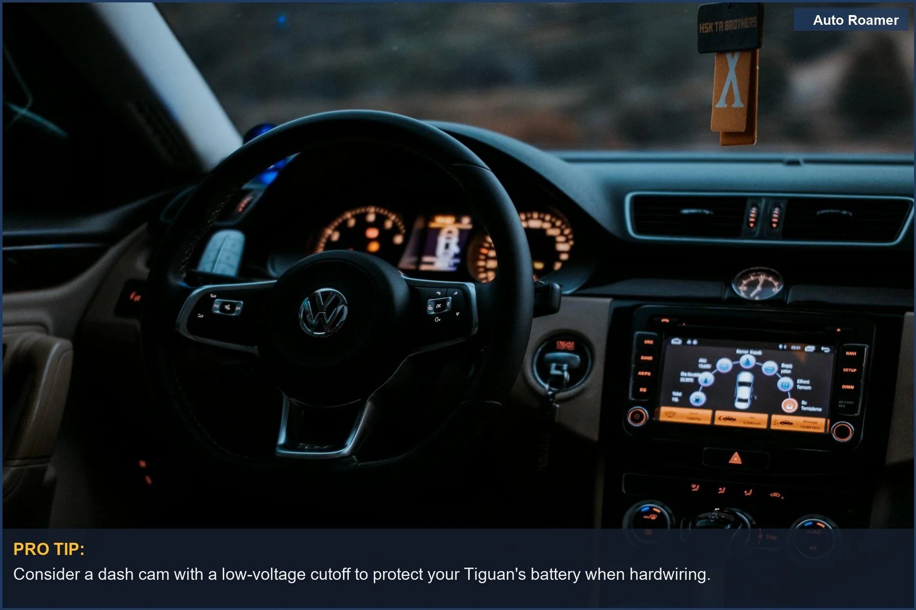 Cozy interior of a Volkswagen, showing the steering wheel and a glimpse of the dashboard display.
