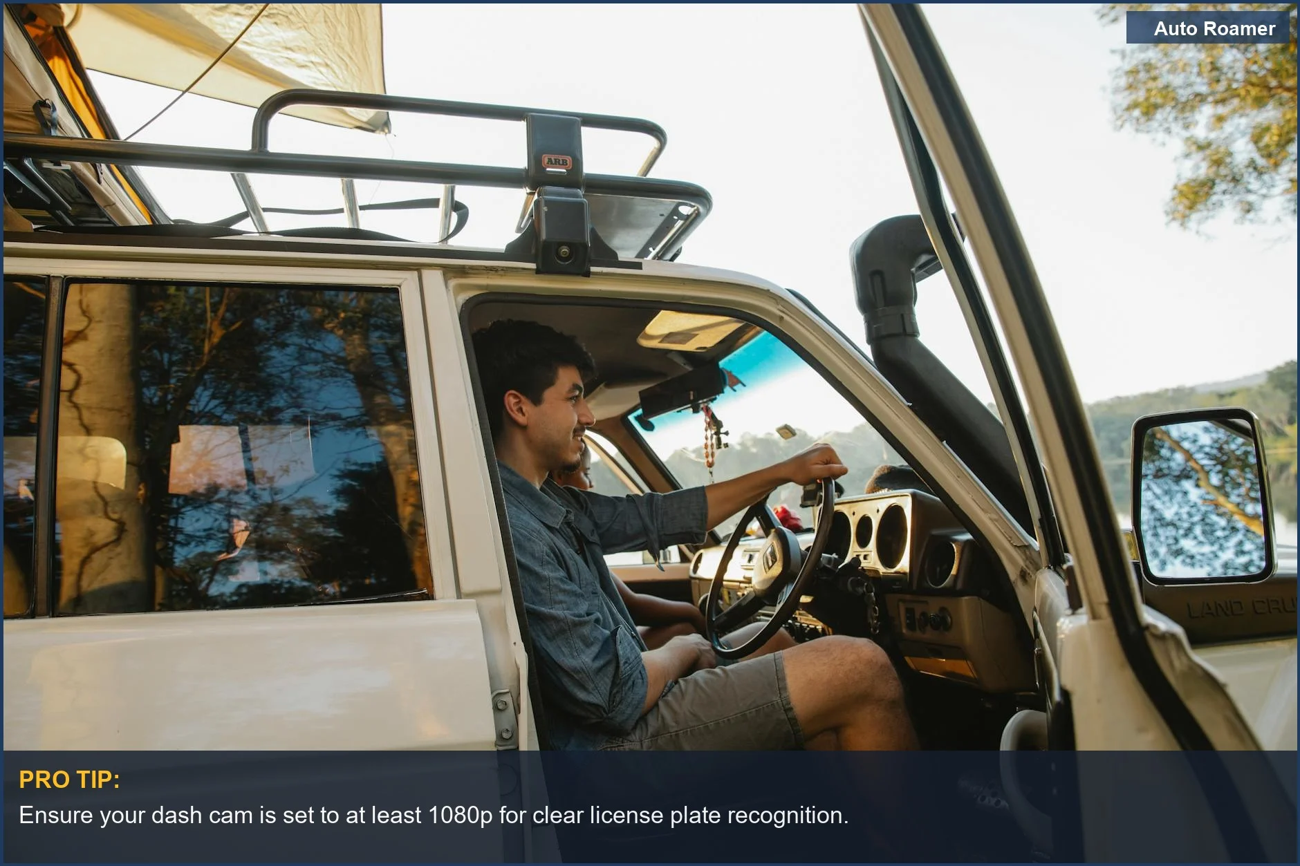 Man driving SUV with roof tent, capturing clear dash cam footage of the road ahead for SUV camping.