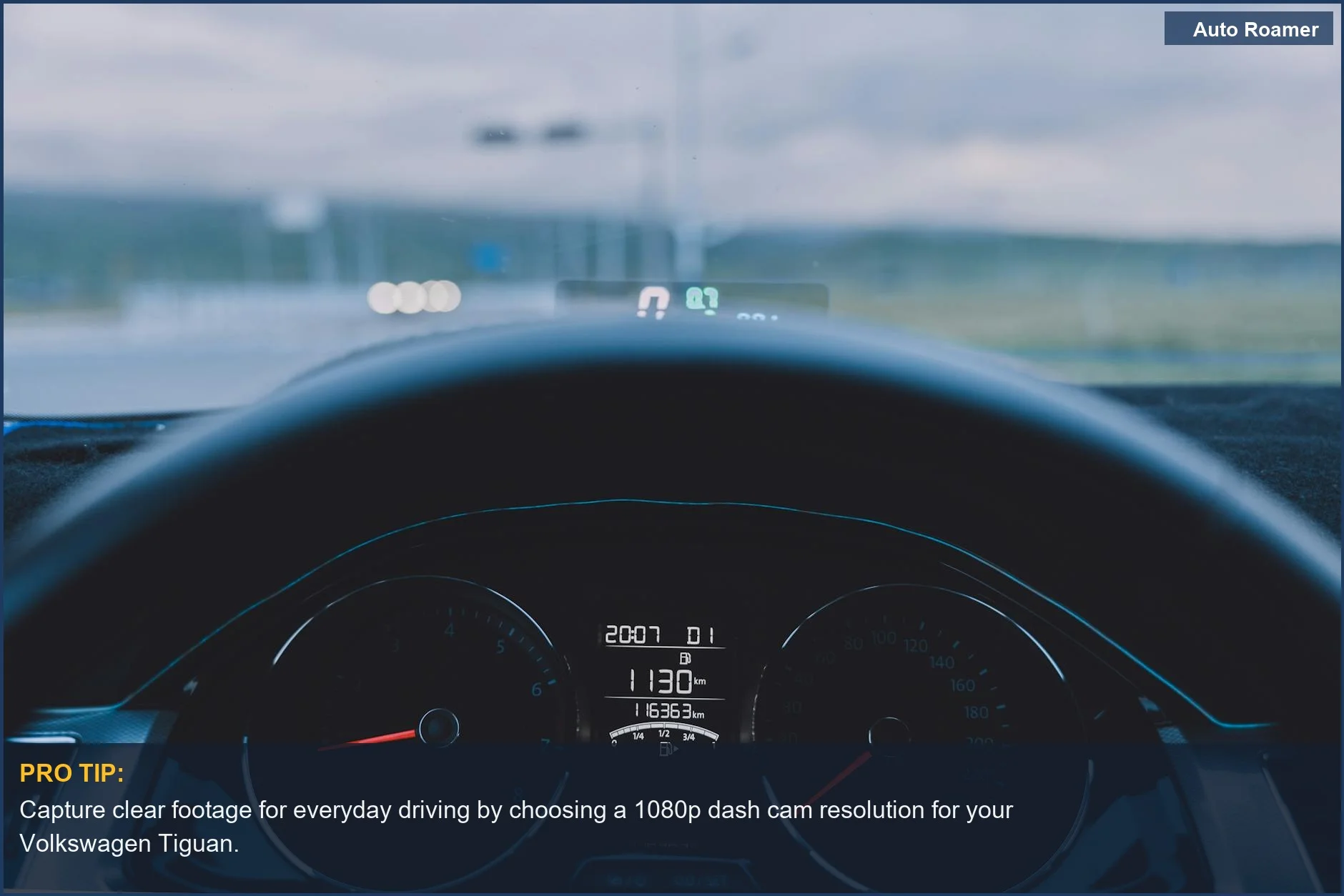 View from inside a Volkswagen Tiguan dashboard looking out at an open road, ideal for understanding dash cam resolution.