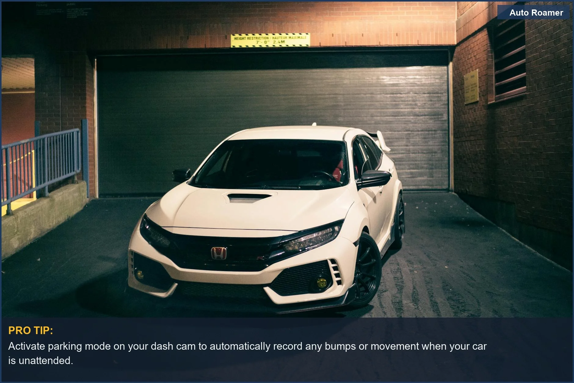 Modern white car parked in a dark urban alley, demonstrating the necessity of a dash cam with parking mode for security.