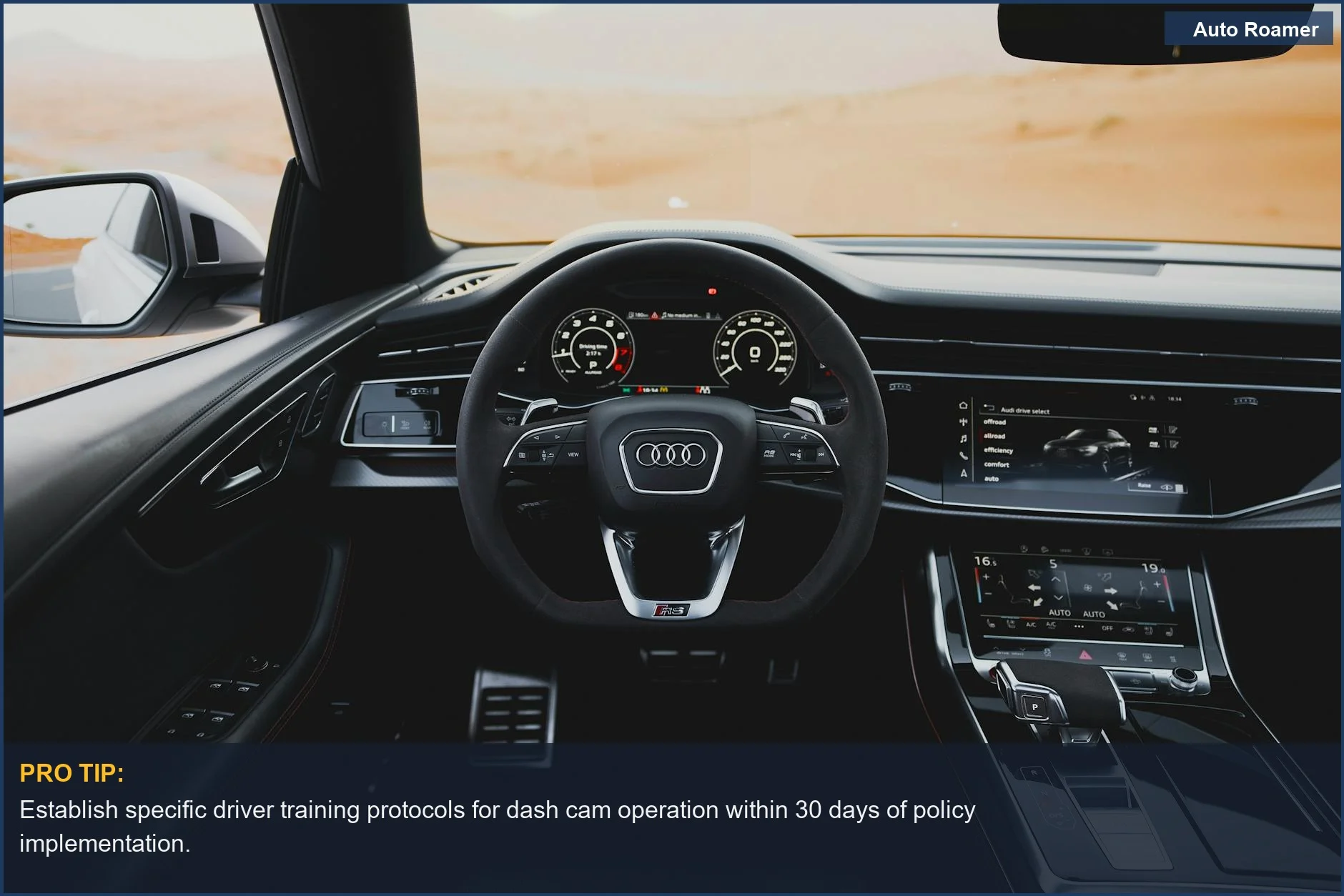 Luxury car interior with digital dashboard in a desert, illustrating the need for a fleet dash cam policy.