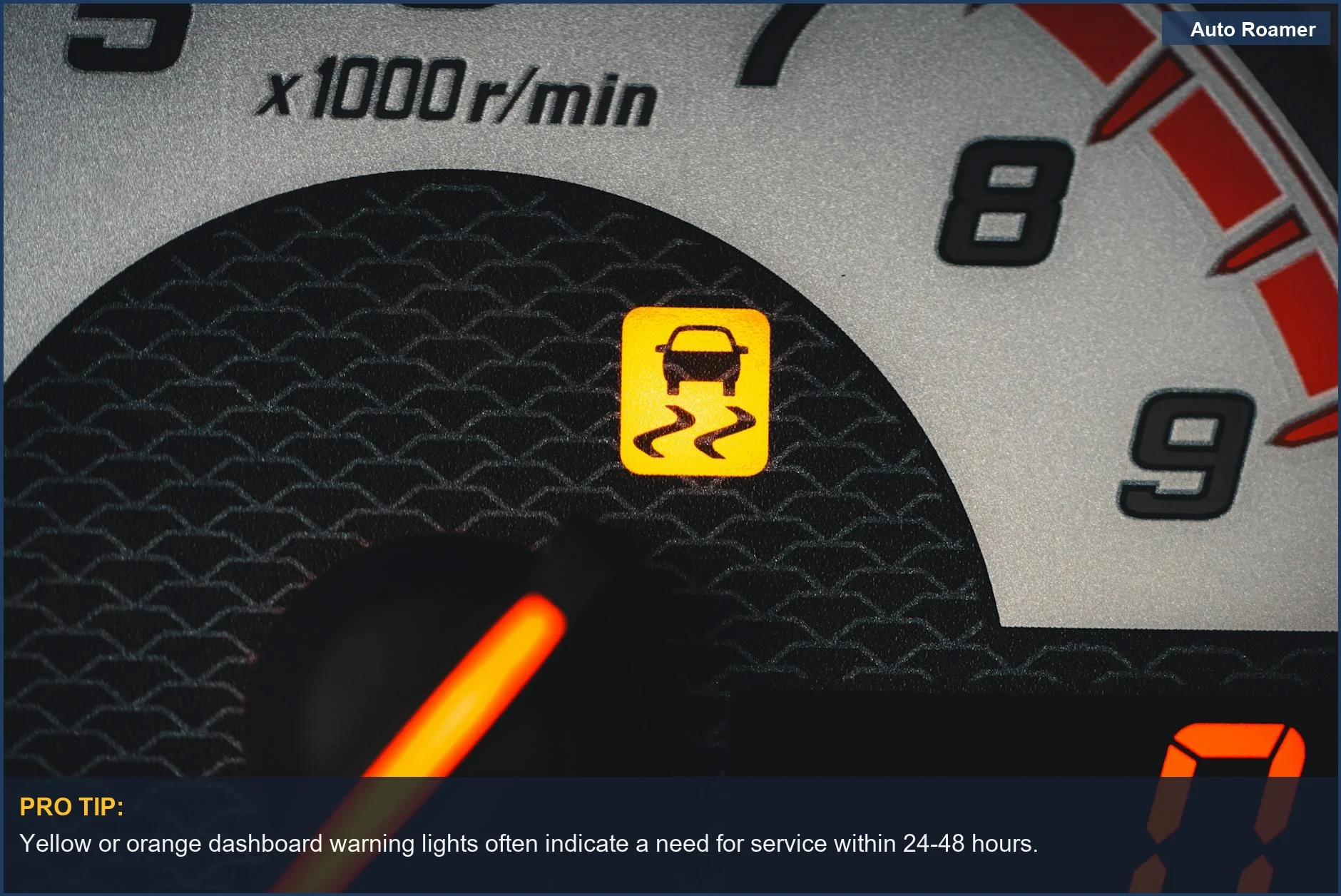 Close-up on a car dashboard featuring a yellow traction control warning light.