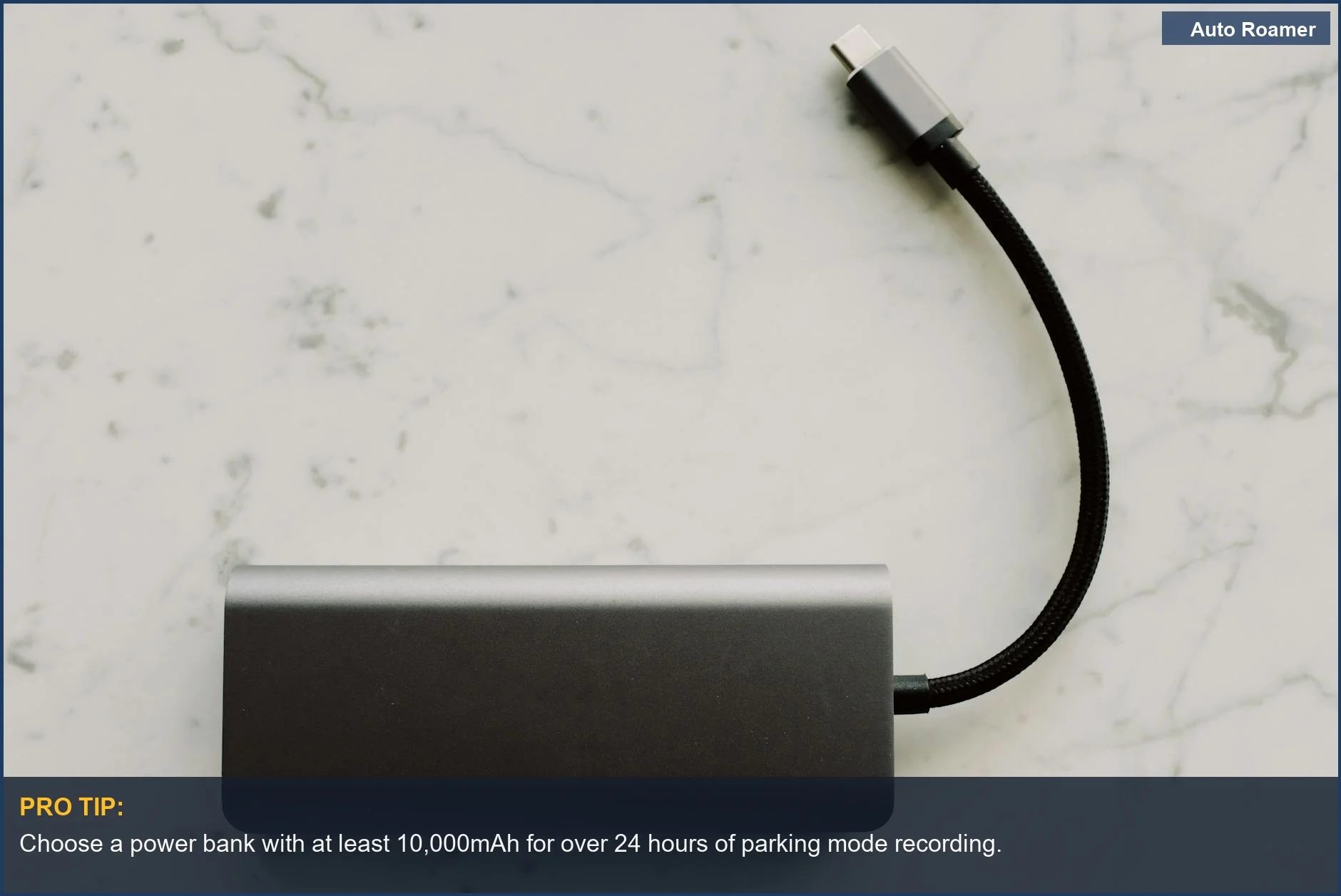 Modern power bank with USB-C cable, perfect for powering dashcams on the go and understanding portable battery types.