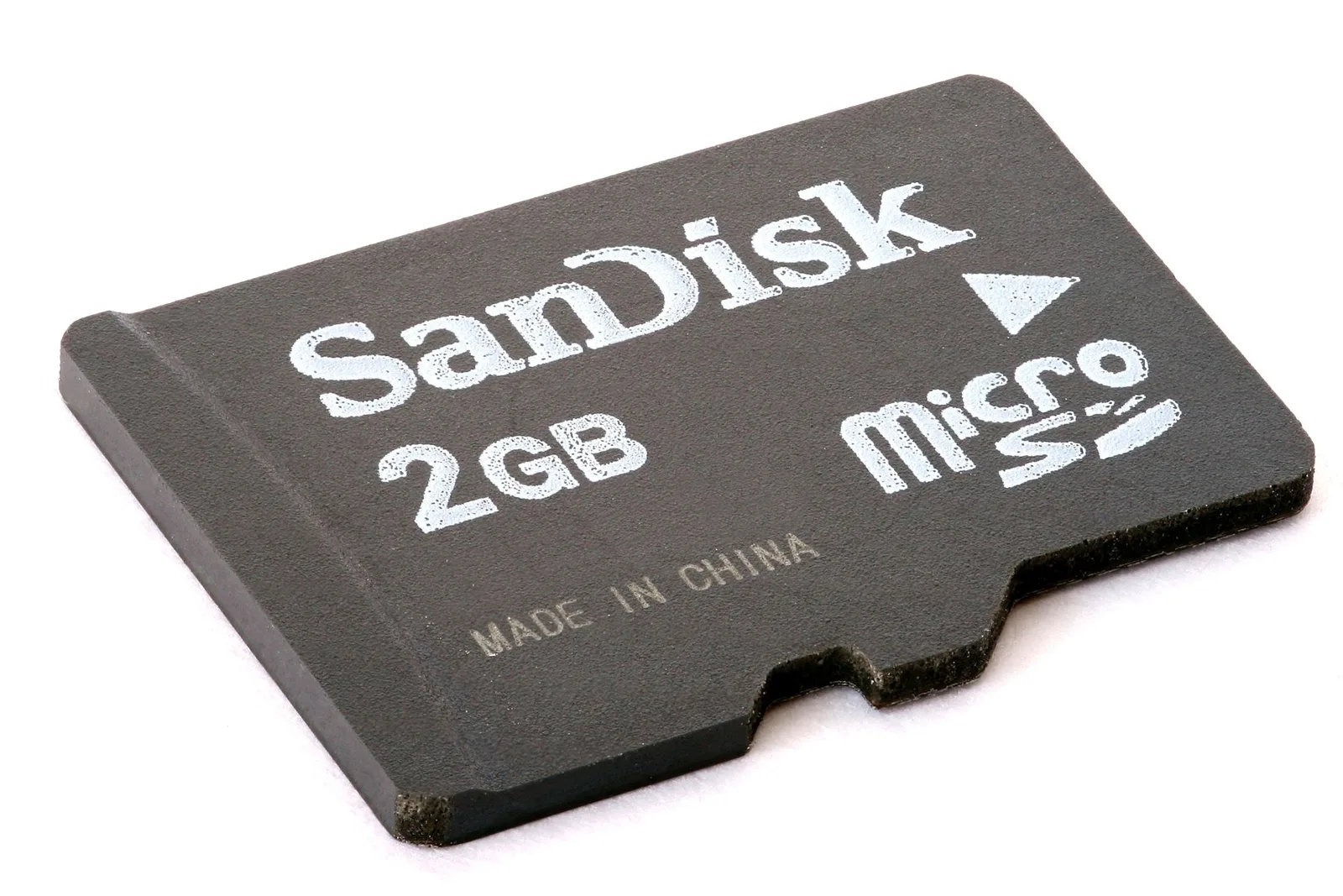 A worn SanDisk microSD memory card, the kind of cheap or fake card that writes broken dashcam files.