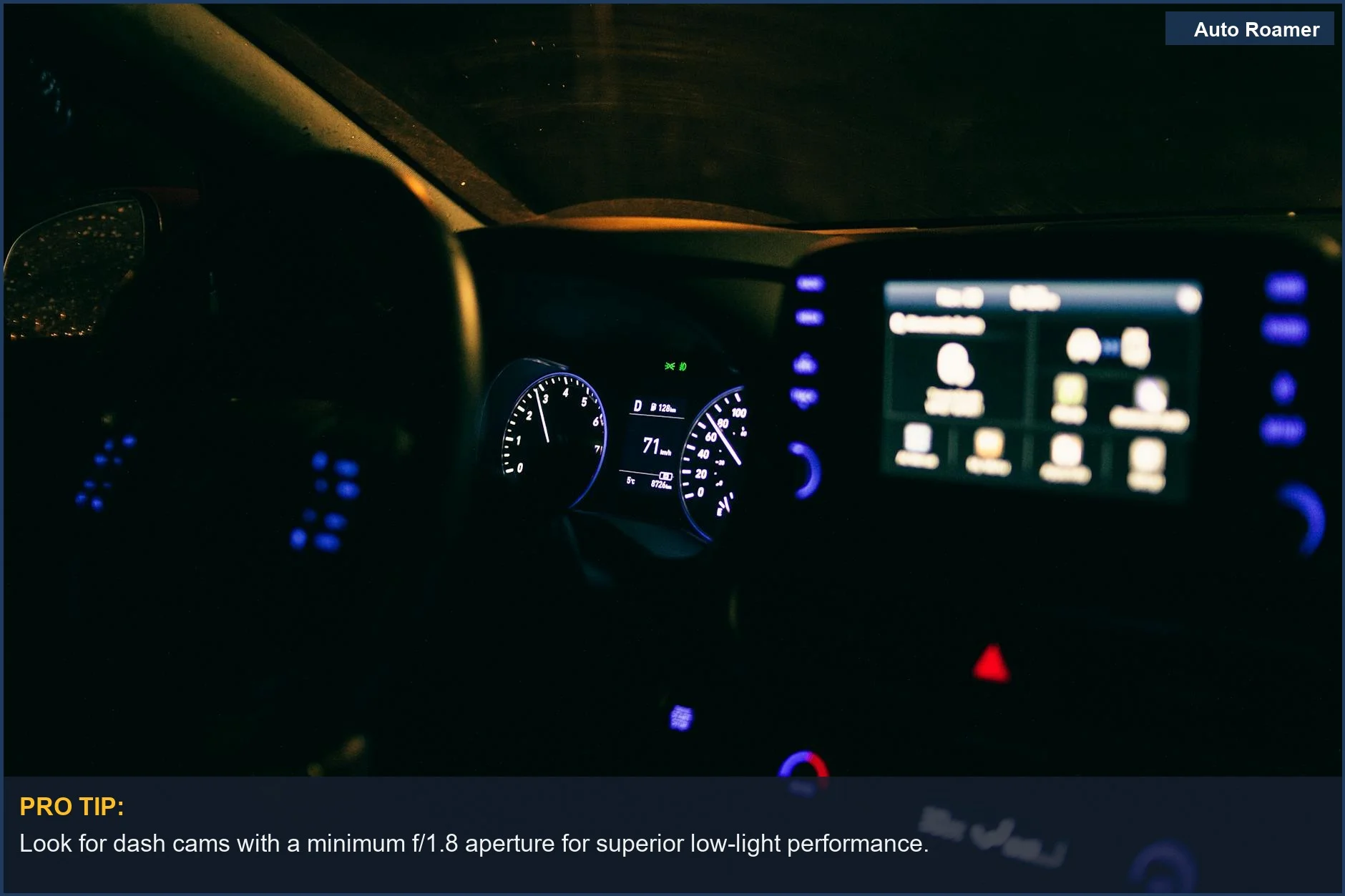 Close-up of a modern car's illuminated dashboard and digital screen, a key dashcam feature.