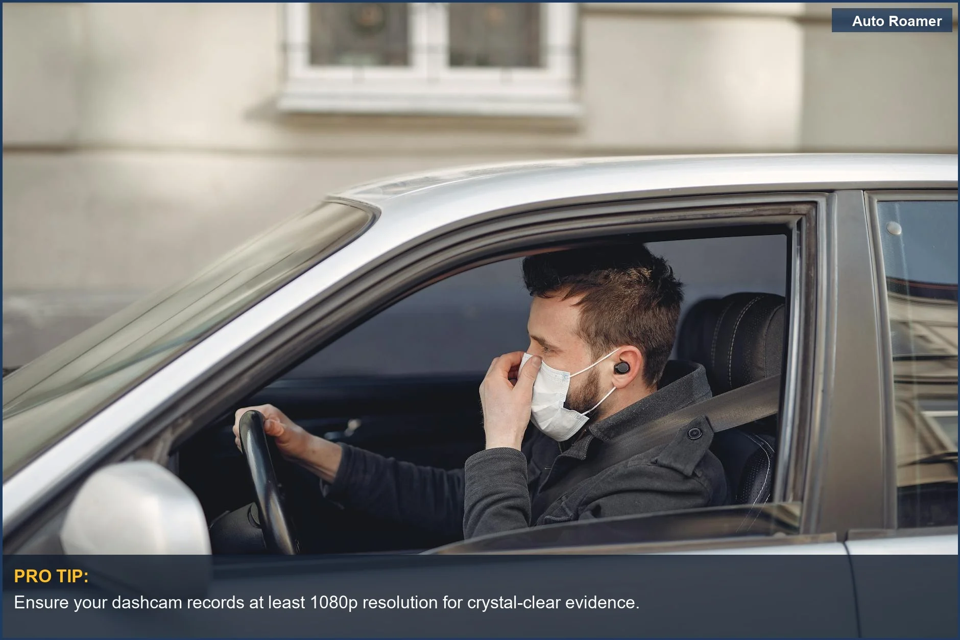 Driver in Tesla Model 3 using dashcam for clear urban journey recordings.