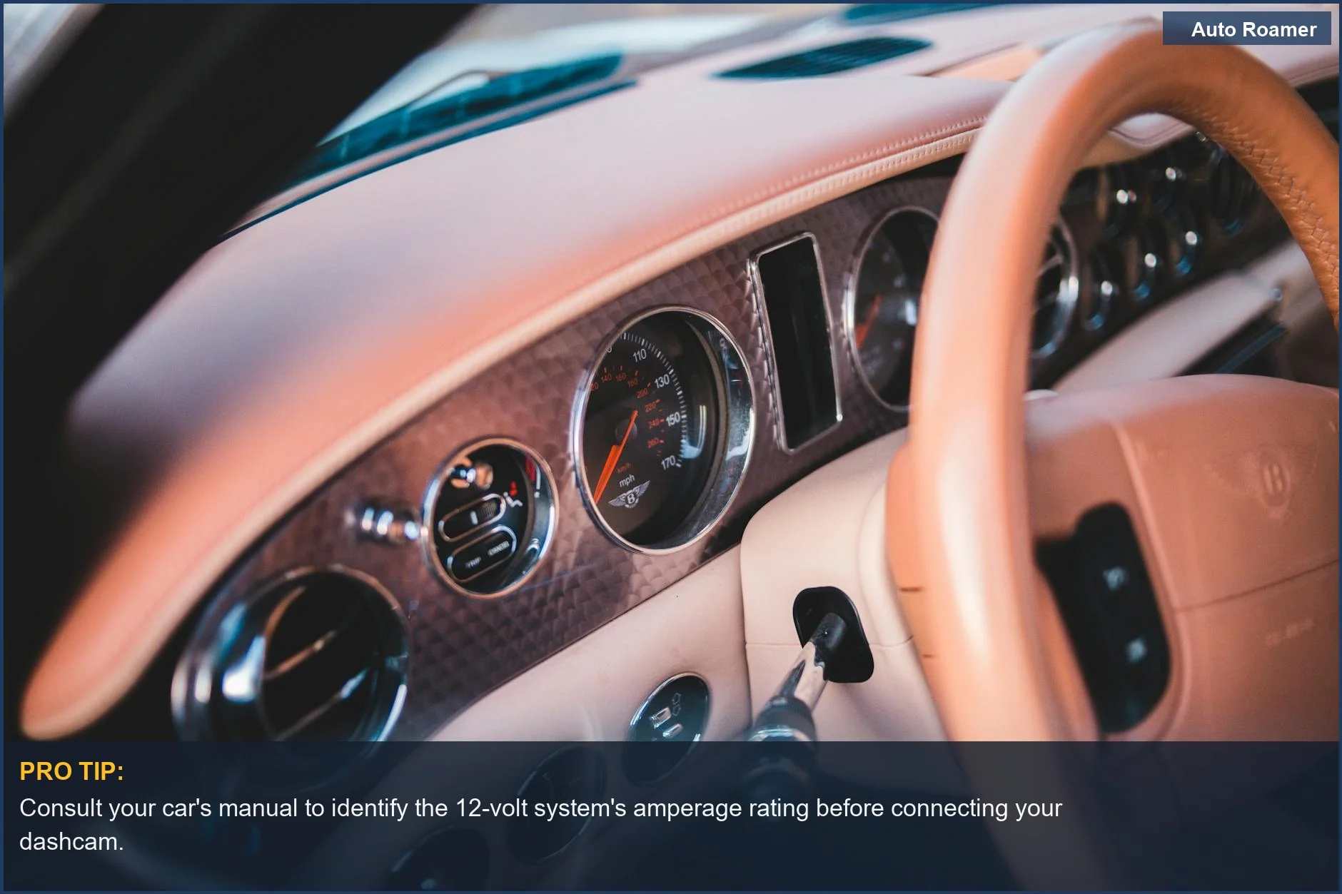 Classic car interior with leather steering wheel, ideal for understanding older car wiring for dashcam power.