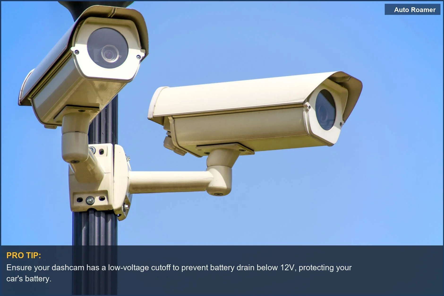 Outdoor security camera on a pole, providing vigilant surveillance against a clear blue sky for car camping security.