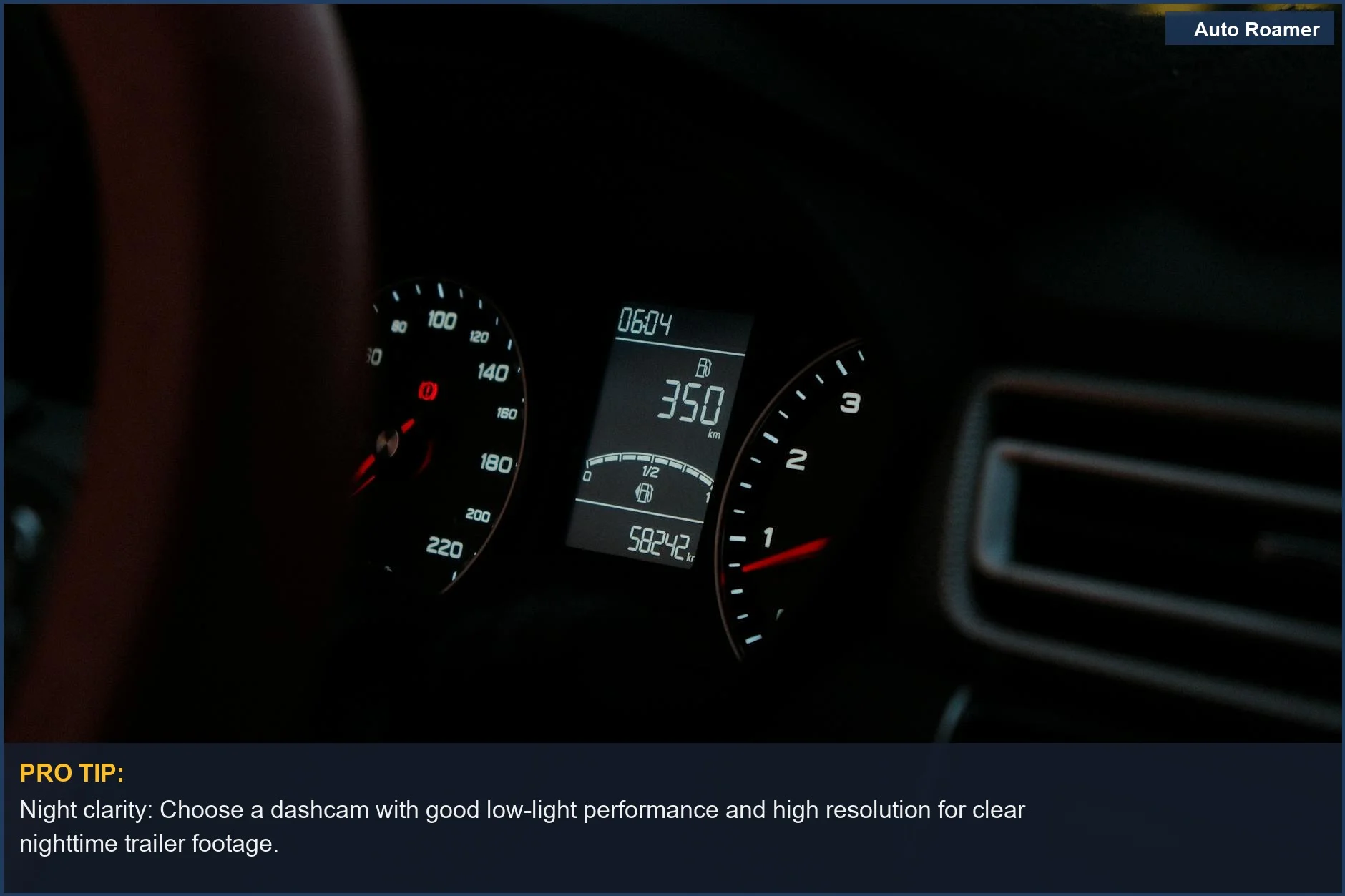 Nighttime car dashboard with digital readout, demonstrating dashcam resolution for low-light trailer footage.