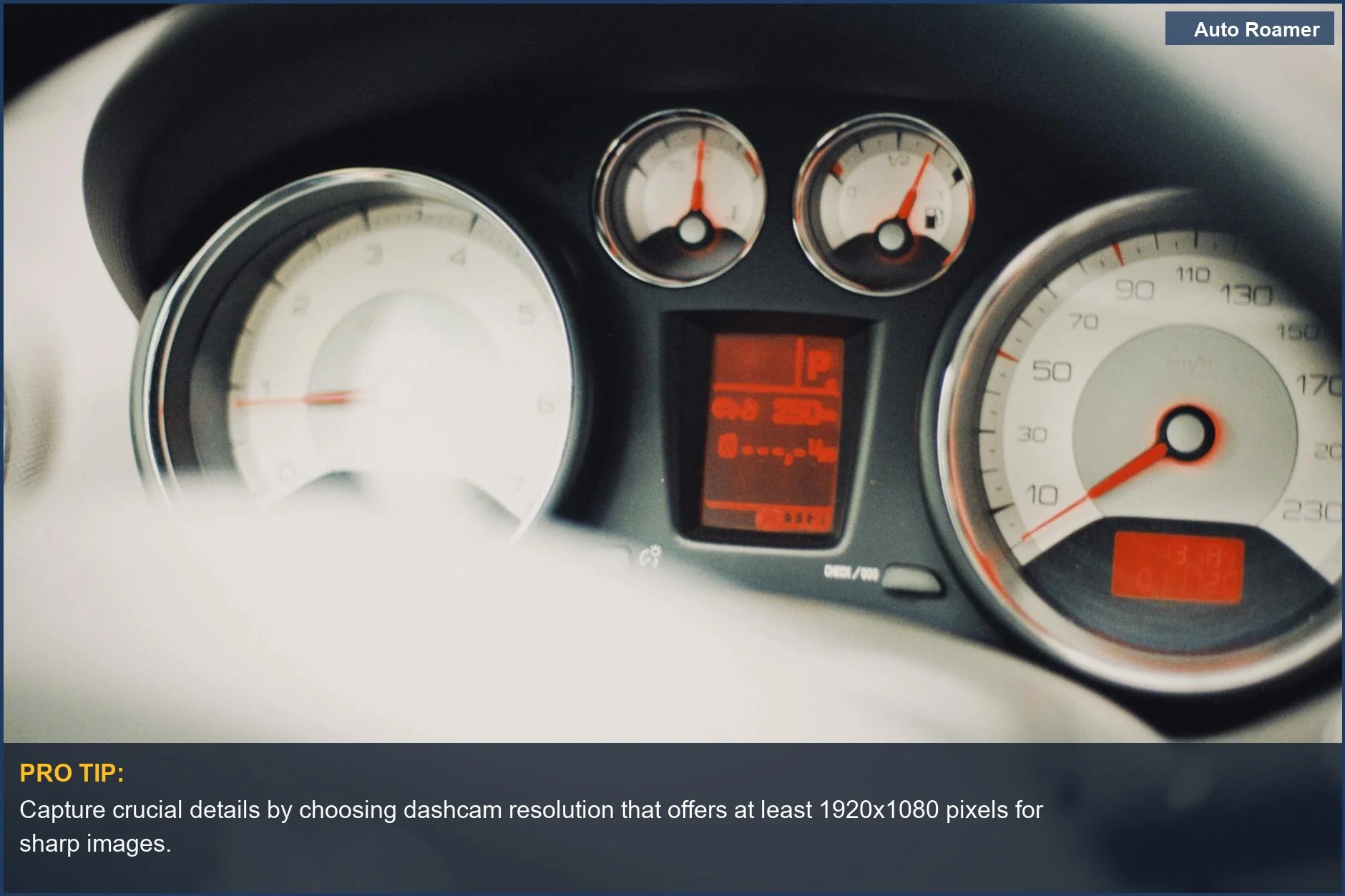 Car dashboard with speedometer, illustrating the importance of dashcam resolution for clear footage.