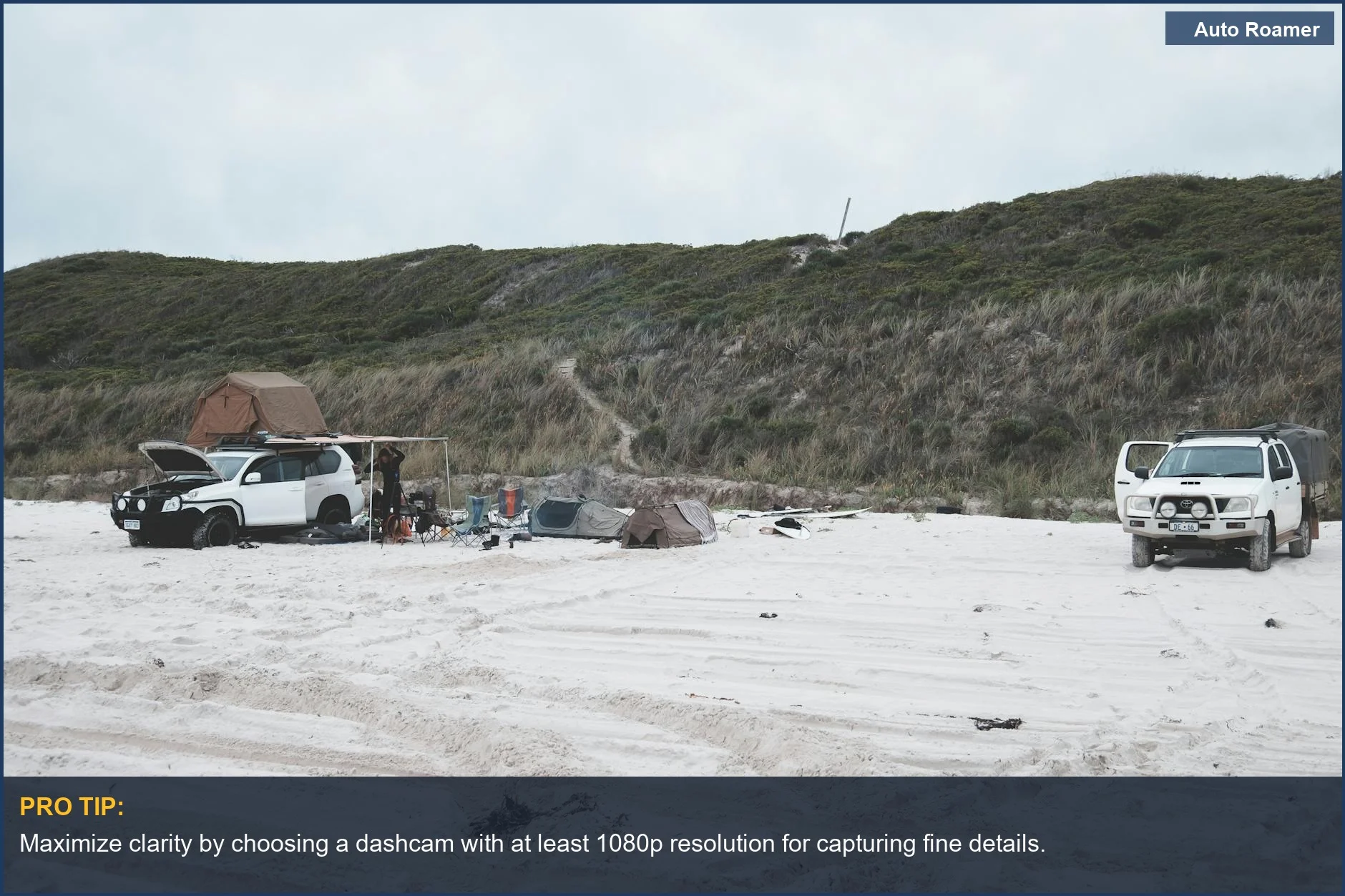 SUV and tents on a peaceful beach campsite, capturing detailed dashcam resolution for clear travel footage.