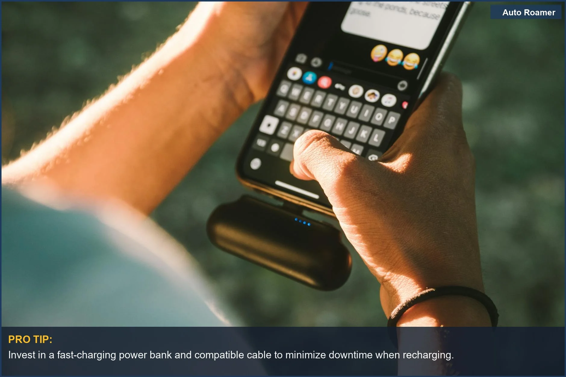 Person texting on a smartphone connected to a power bank, demonstrating on-the-go charging solutions.