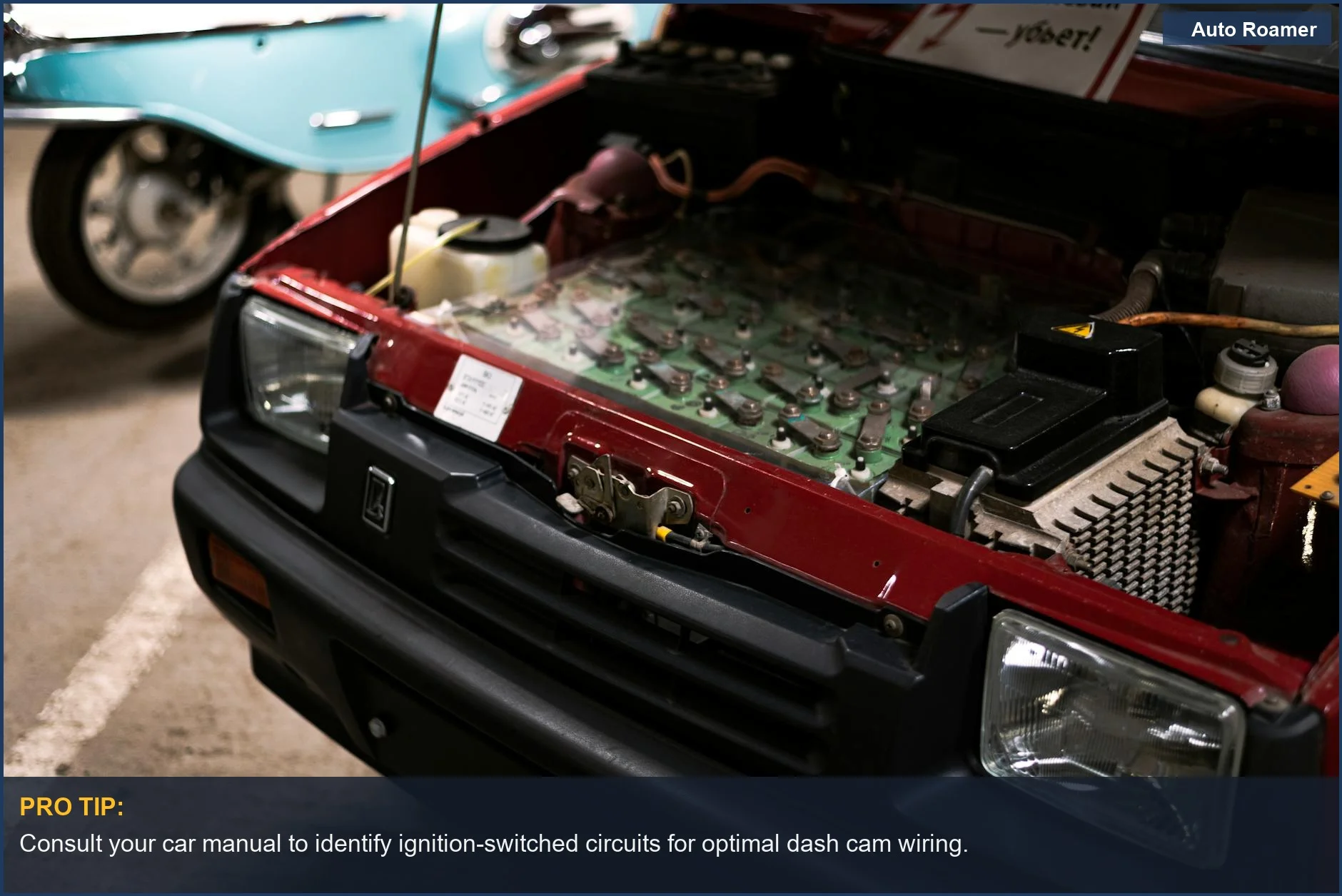 Detailed view of a car engine compartment and its electrical connections, relevant to dash cam power.