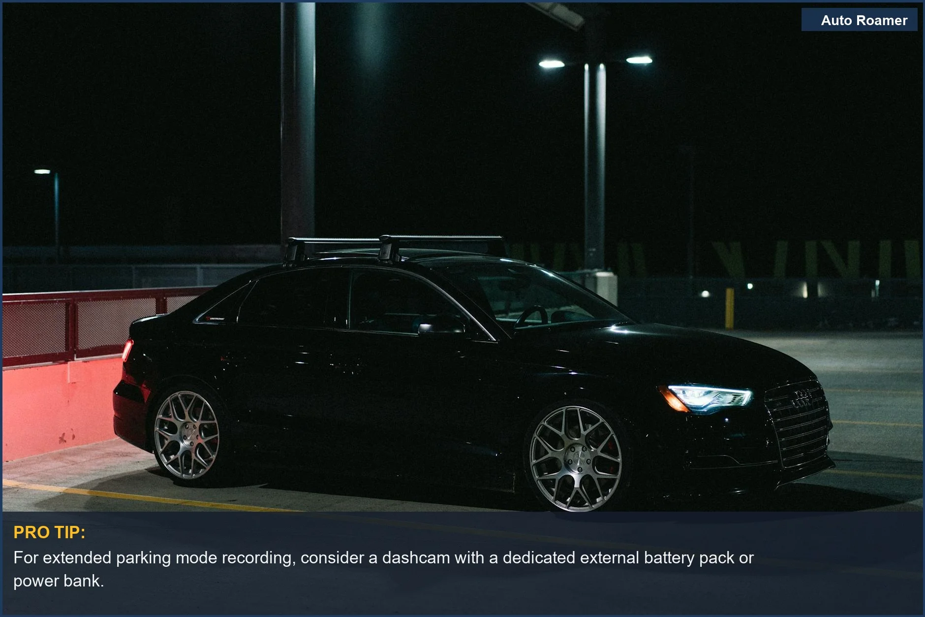 Sleek black luxury car in a dimly lit urban setting, showing a scenario where dashcams can provide surveillance when the car is off.