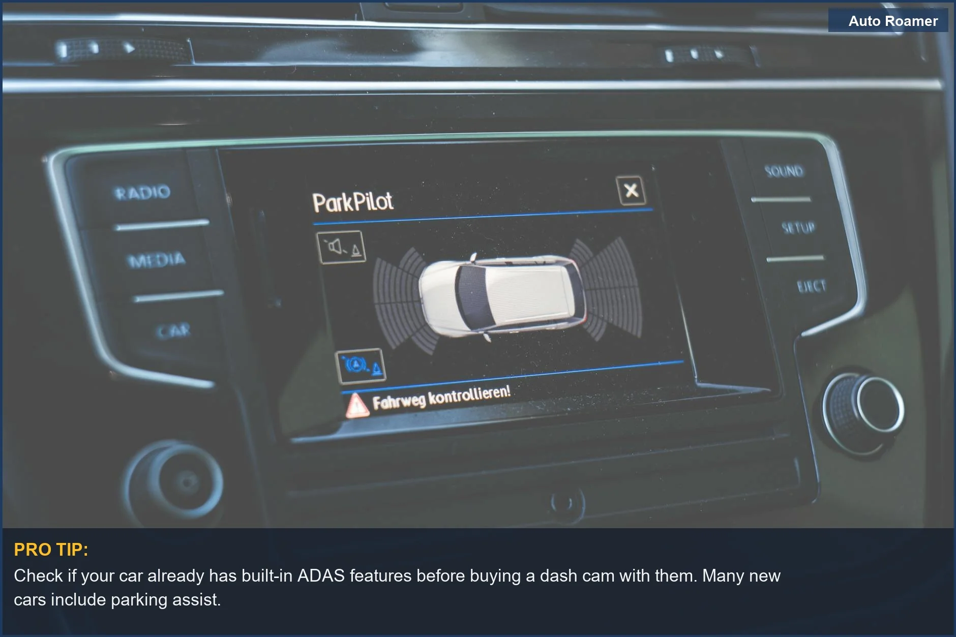 Car dashboard with ADAS ParkPilot display, highlighting advanced dash cam safety features for modern vehicles.