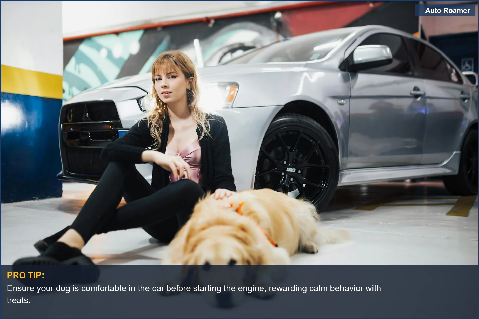 Golden Retriever and owner in a parking garage, preparing for a car ride to prevent motion sickness.