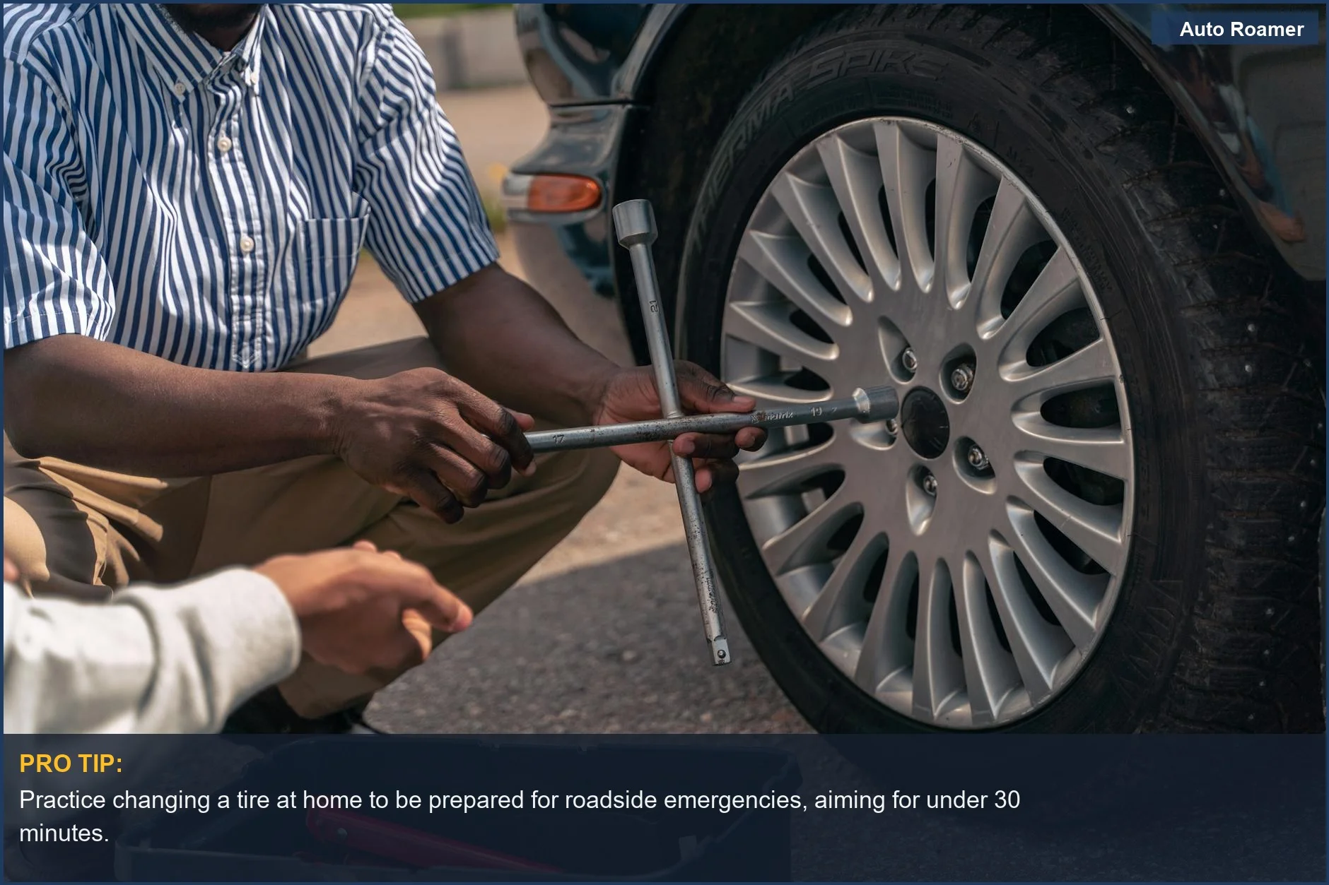 Adult teaching a teenager how to change a tire, emphasizing learning roadside assistance skills.
