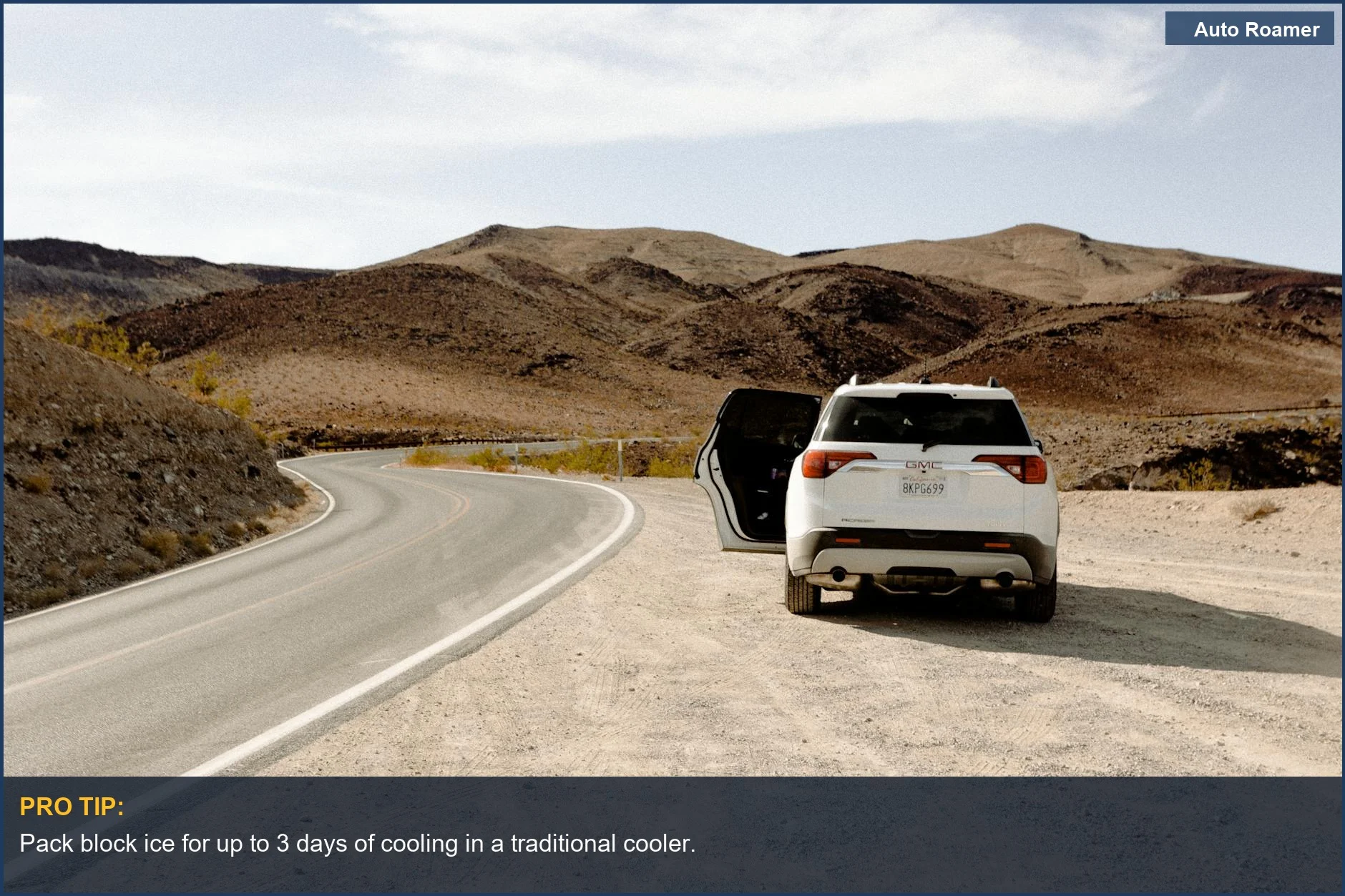 White SUV on a desert road, perfect for comparing road trip cooling options.
