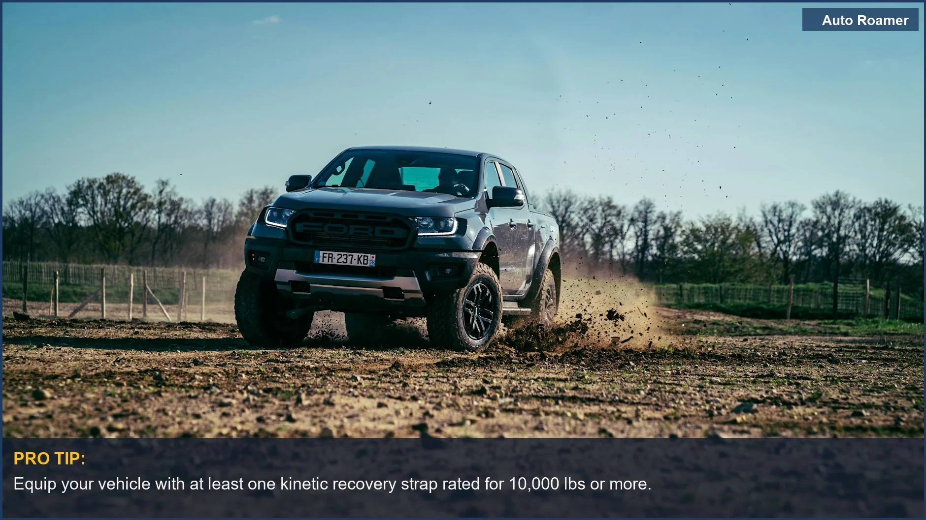 Rugged SUV driving off-road, kicking up dirt, essential off-road gear for any adventure.