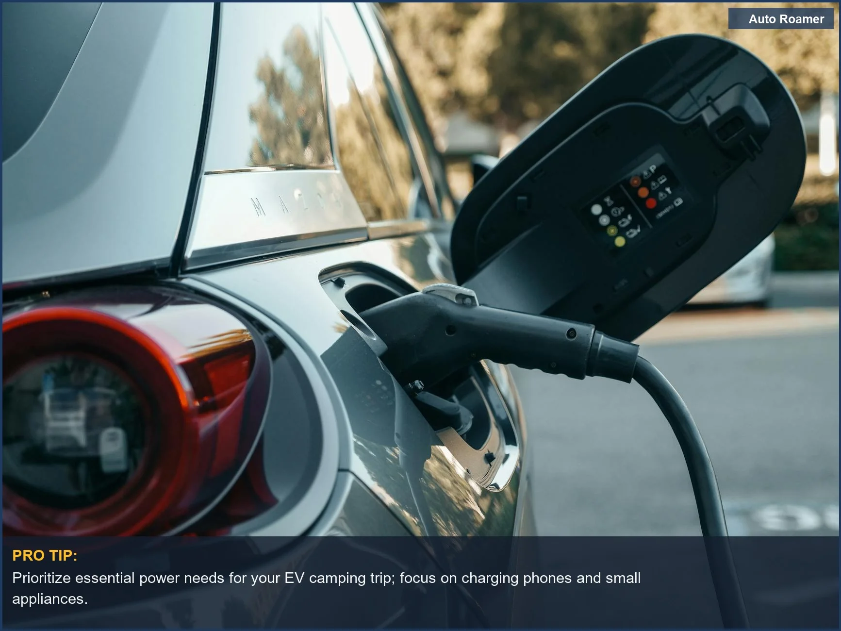 Close-up of an electric vehicle charging port, highlighting modern sustainable energy for camping.