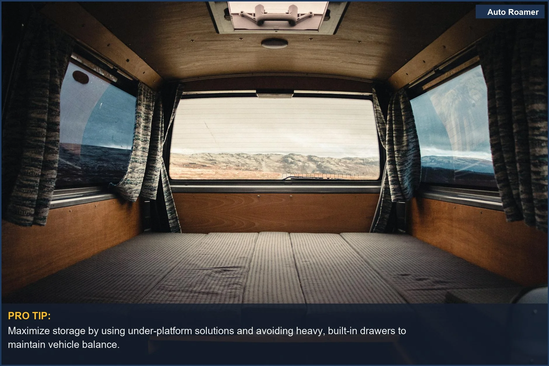 Spacious camper van interior showcasing efficient storage solutions with scenic views.
