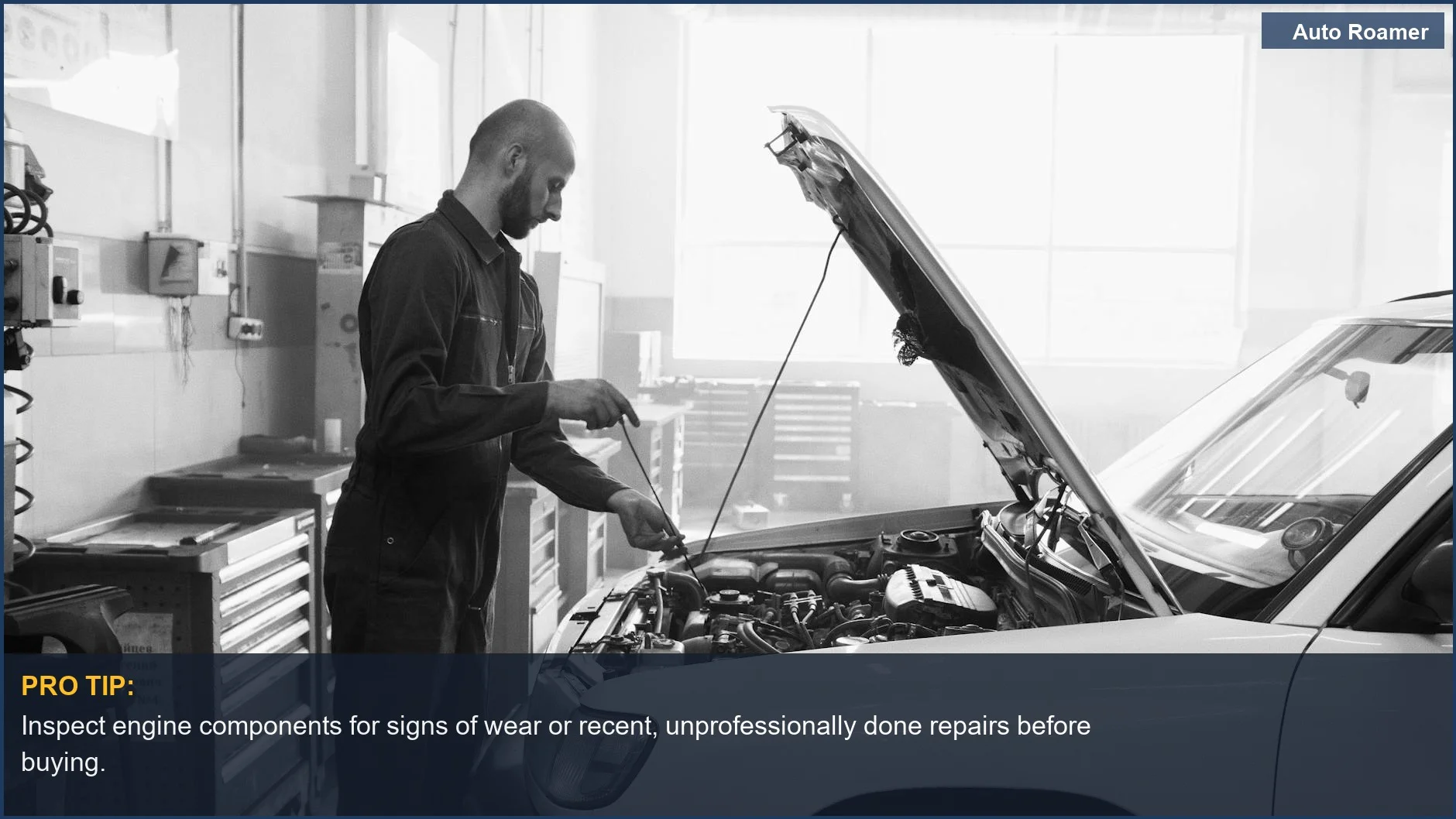 Mechanic performing engine maintenance, crucial for evaluating hidden safety issues in used family vehicles.