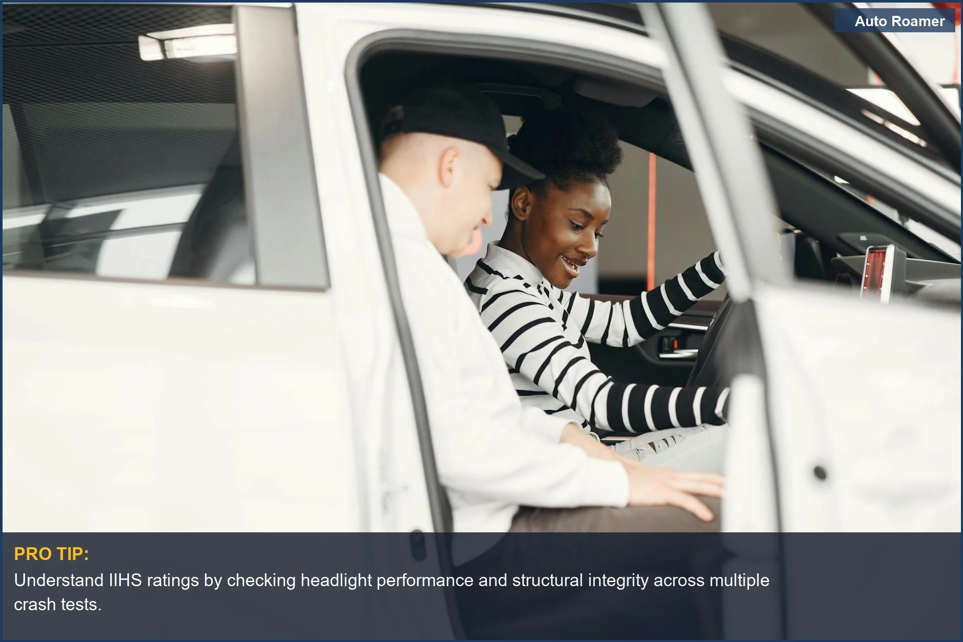 Couple discusses vehicle safety ratings for family road trip car upgrades at a dealership.