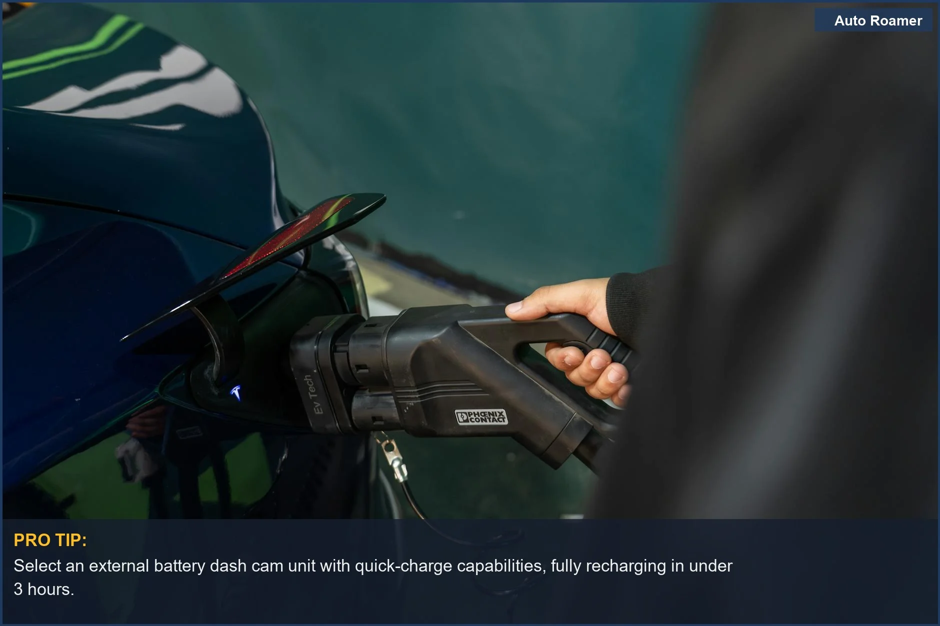 Detailed view of an electric vehicle's charging cable connected to a station, showing external battery dash cam solutions.