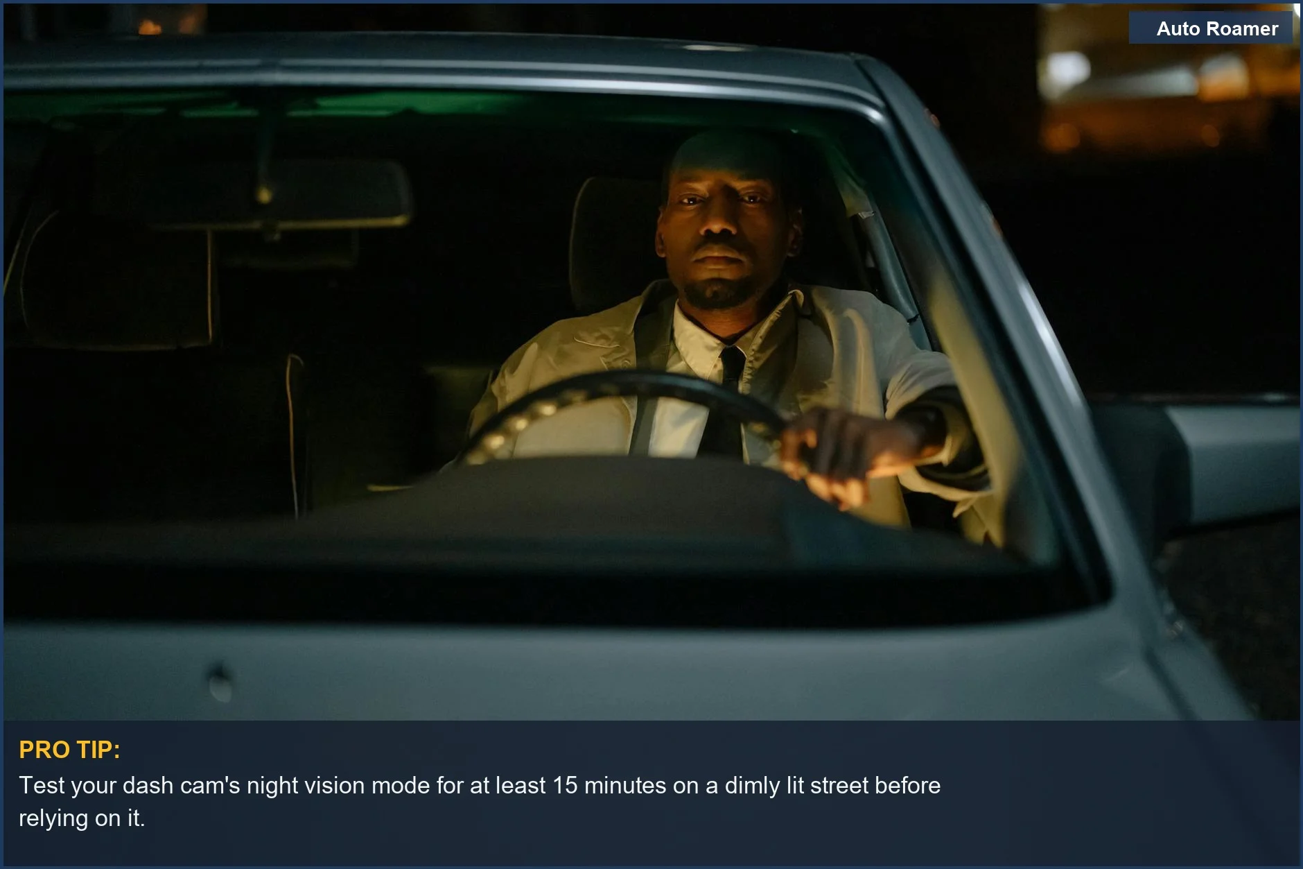 Man driving at night on a road ahead through windshield, illustrating dash cam's night vision capabilities.