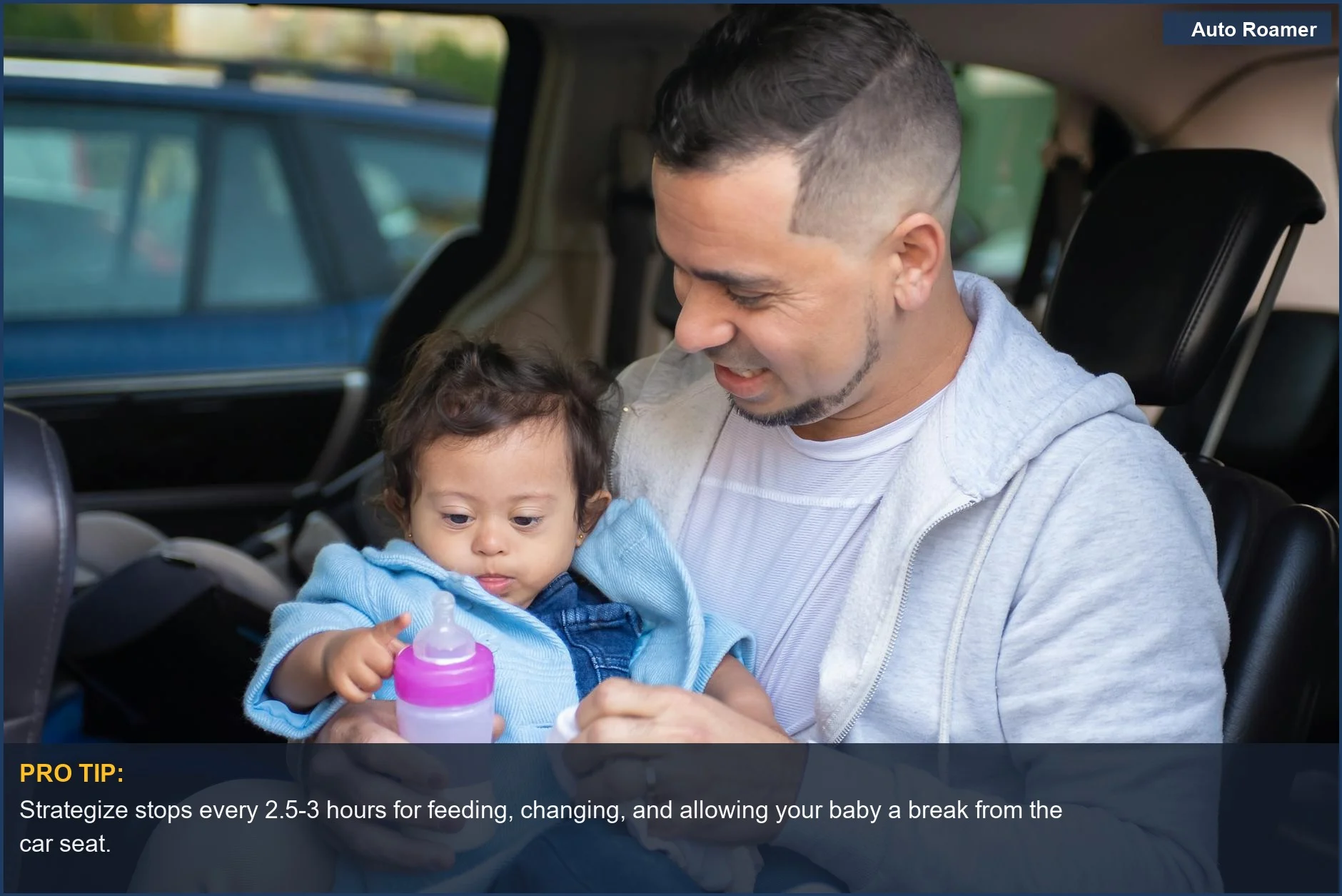 A caring father feeds his baby a bottle inside the car, a crucial part of any newborn road trip checklist strategy.