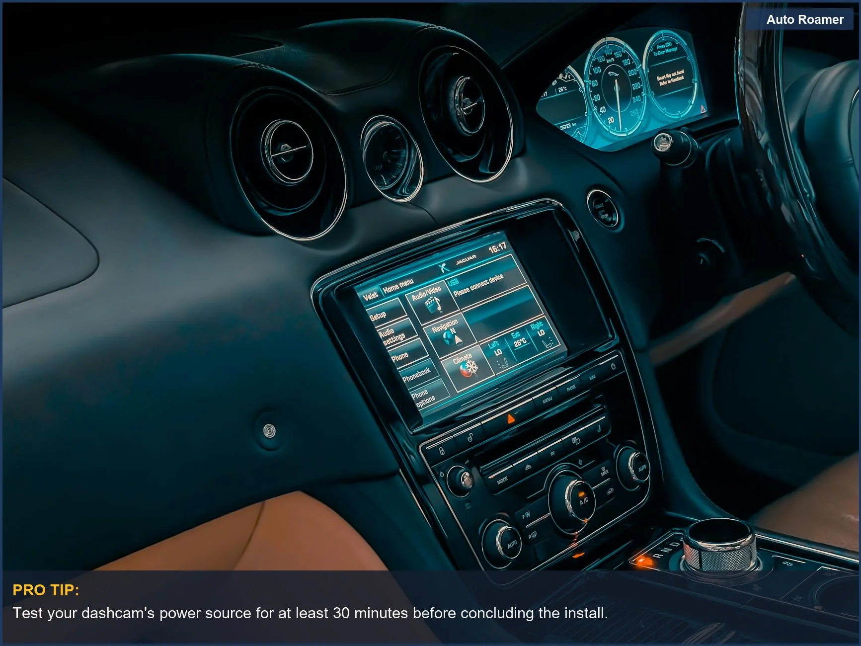 Luxury car interior close-up showing touchscreen and controls for dashcam integration.