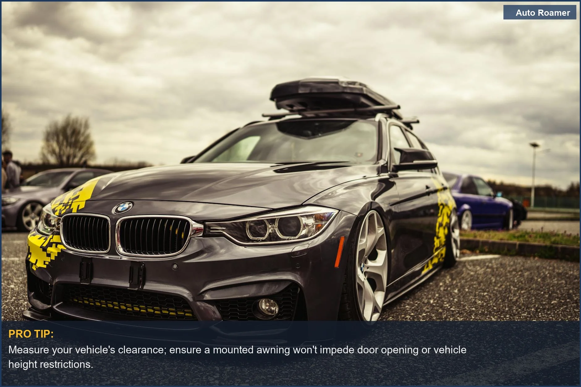 Luxury BMW sedan with a sleek roof rack, hinting at versatile SUV camping accessories.