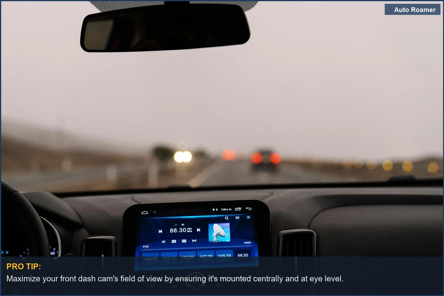 Car dashboard interior on an open road, showcasing a front dash cam's view for travel.