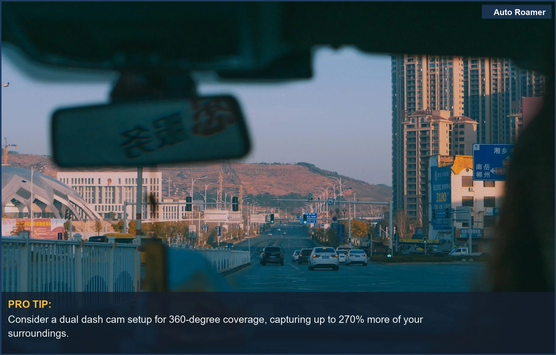 Cityscape through a car windshield during morning light, emphasizing dash cam coverage.