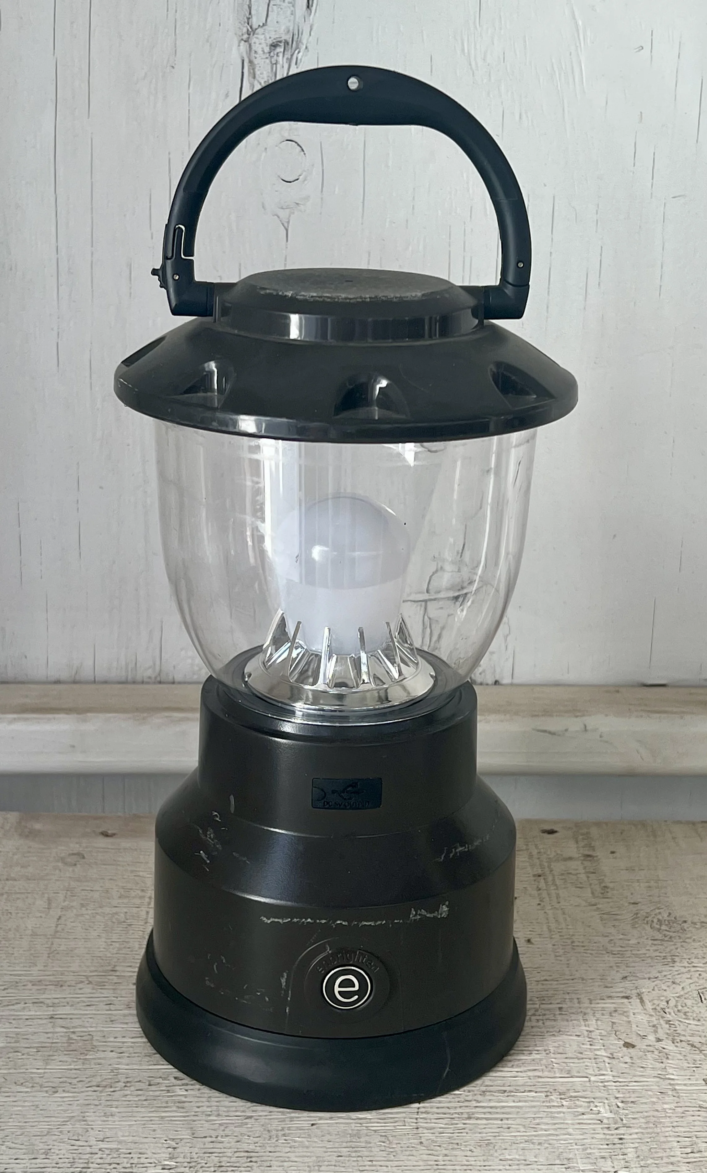 An Enbrighten LED camping lantern, one of the rechargeable options this guide weighs against fuel-burning lanterns.