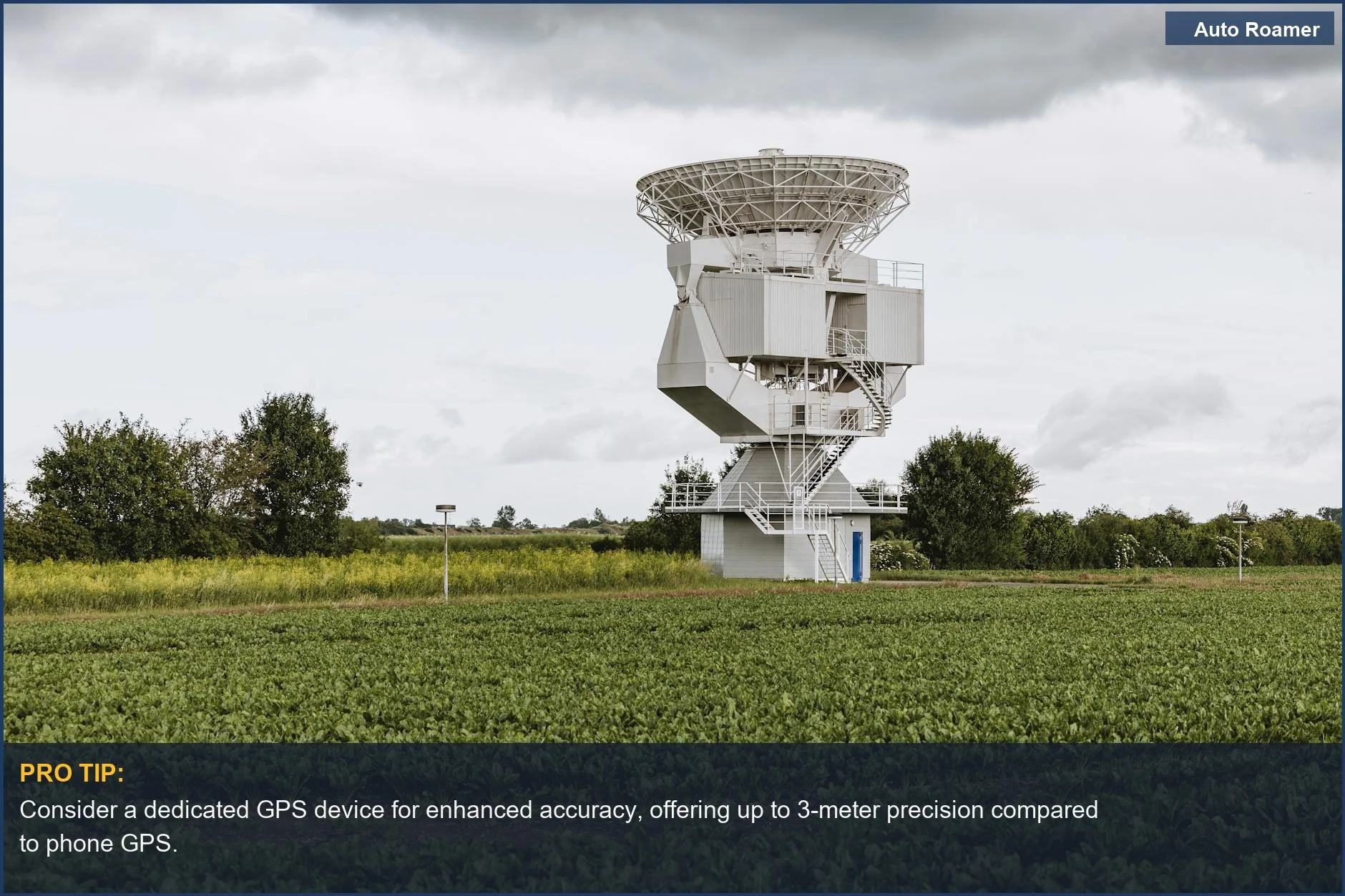 Large satellite antenna in a lush field, demonstrating the infrastructure supporting remote exploration with GPS.